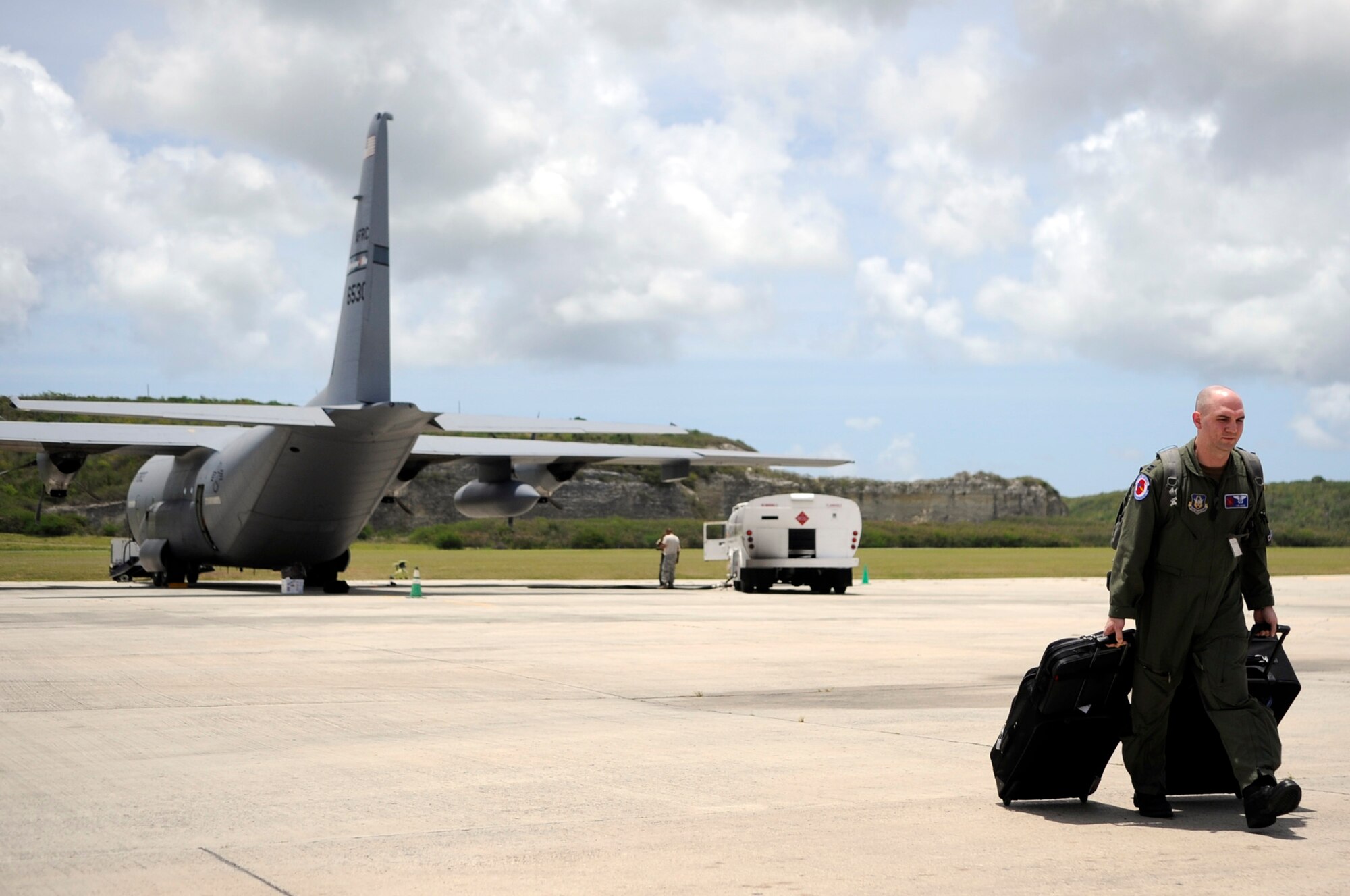 Capt. Tobi Baker arrives at St. Croix, V.I., after a training mission on a WC-130J  Hercules from Keesler Air Force Base, Miss. Captain Baker is an aerial weather reconnaissance officer assigned to the Hurricane Hunters of the 53rd Weather Reconnaissance Squadron. (U.S. Air Force photo/Staff Sgt. Desiree N. Palacios)