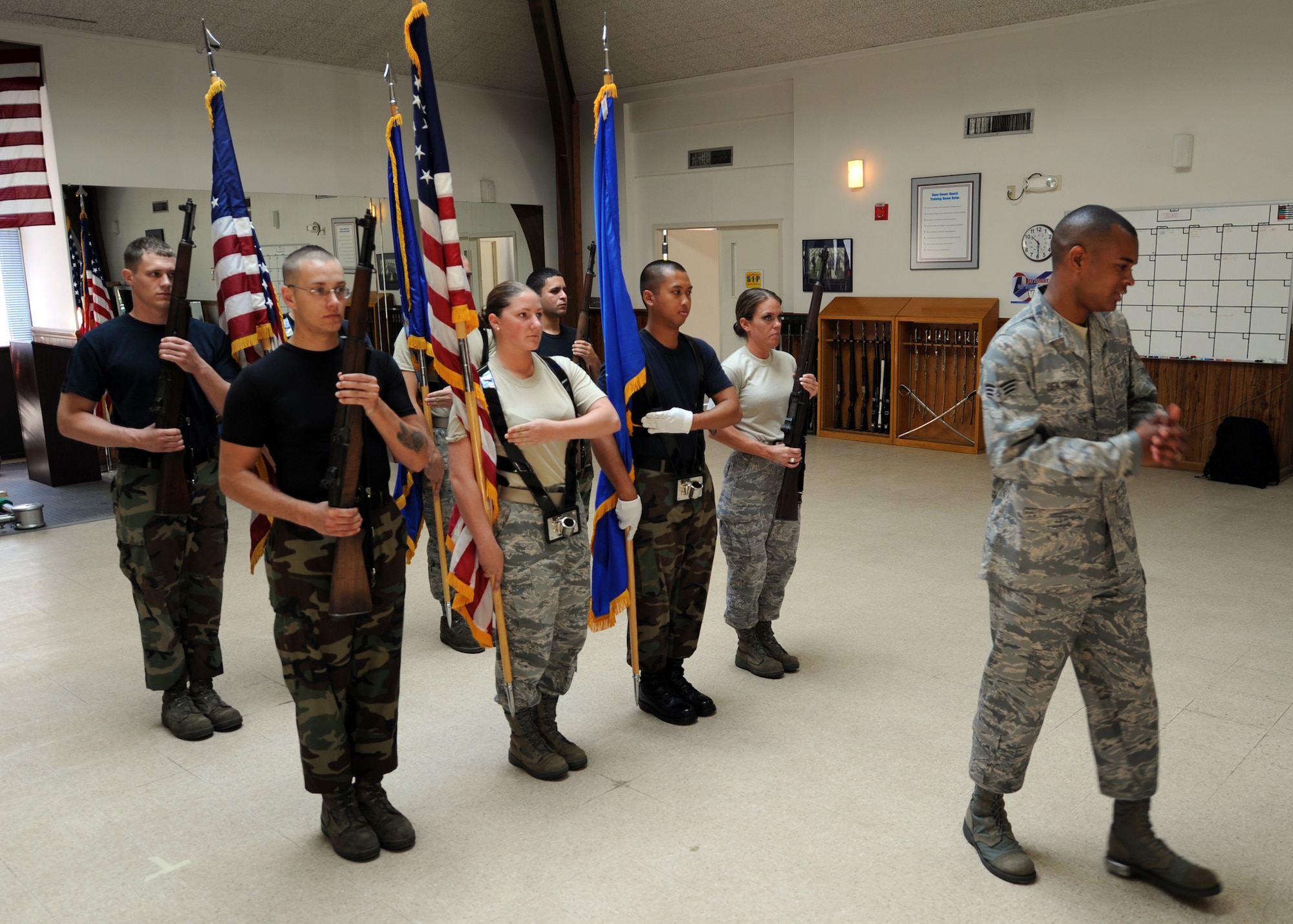 Senior Airman Paul Benjamin instructs honor guard members on the proper method for posting the colors June 3. The Charleston AFB honor guard hosted the Air Force's Honor Guard Mobile Training Course June 1 to 10. Airman Benjamin is a Formal Training Flight Instructor for the Air Force Honor Guard Headquarters. (U.S. Air Force photo/Senior Airman Timothy Taylor)
