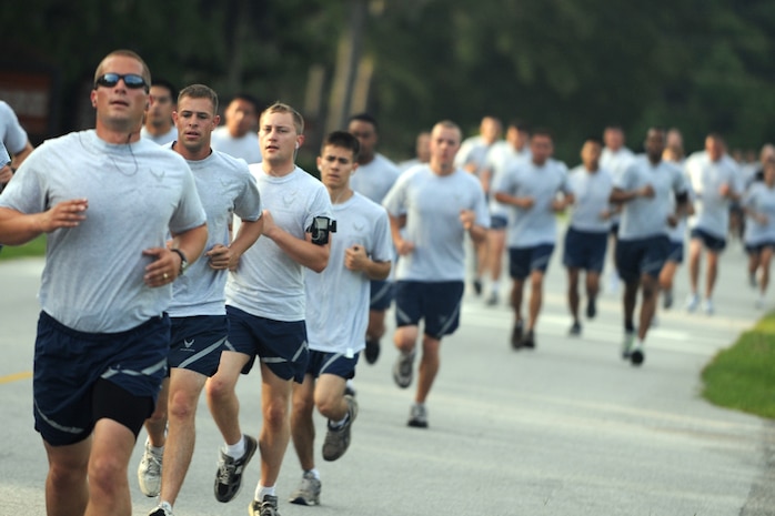 Team Charleston Airmen pace themselves as they near the three-quarter mark of the Commander's Fitness Challenge 5K run on Charleston AFB June 5. More than 350 Airmen from various units participated in the run. (U.S. Air Force photo/Senior Airman Timothy Taylor)