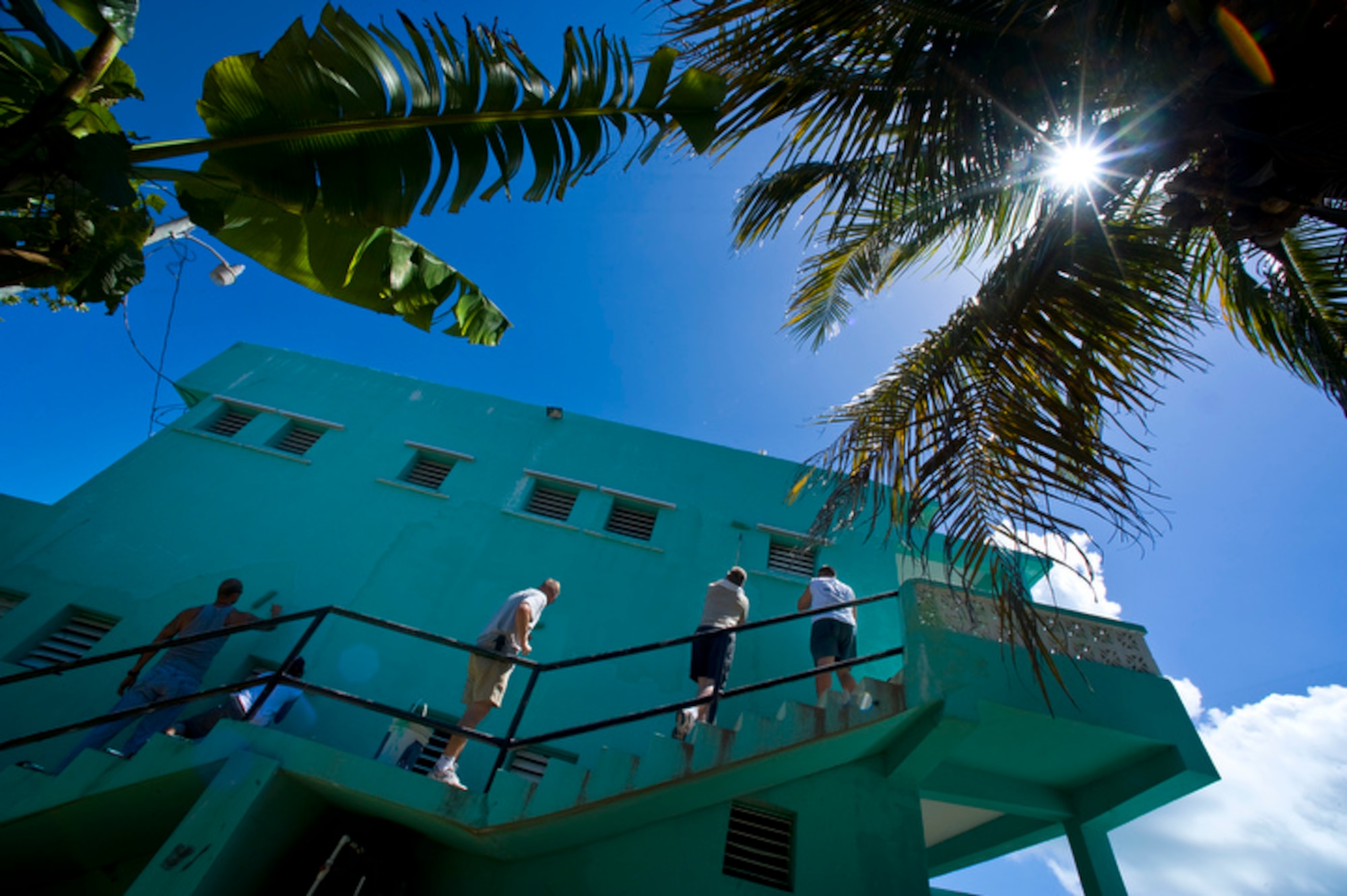 Members of Operation Southern Partner spent the day painting the 13-classrom Stella Maris School for the Physically Disabled June 8 in Belize City, Belize. (U.S. Air Force photo/Staff Sgt. Bennie J. Davis III)