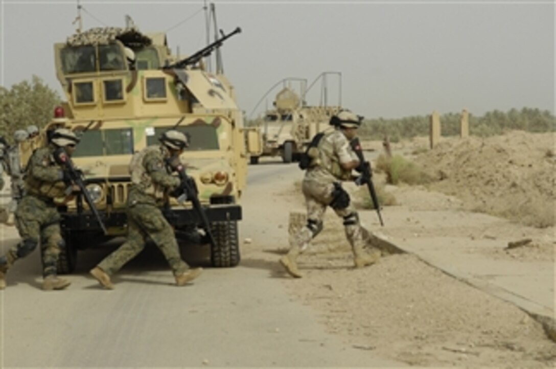 Iraqi soldiers participate in a combined training exercise near Bahbahani, Iraq, on June 6, 2009.  The exercise is being conducted with U.S. Army soldiers from Echo Company, 5th Cavalry Regiment, 172nd Infantry Brigade.  