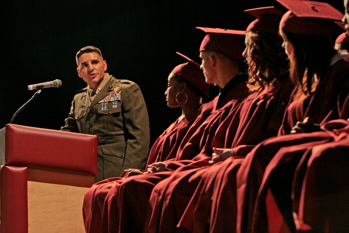 Lt. Col. Tray J. Ardese, commanding officer of Headquarters and Headquarters Squadron here, shares words of wisdom at the M.C. Perry High School’s Class of 2009 graduation ceremony held at the Sakura Theater here June 10. “You will be shaped by the choices you make,” Ardese said. “Like tending to a tree, you reap what you sow.” A total of 18 students received their diplomas at the ceremony.