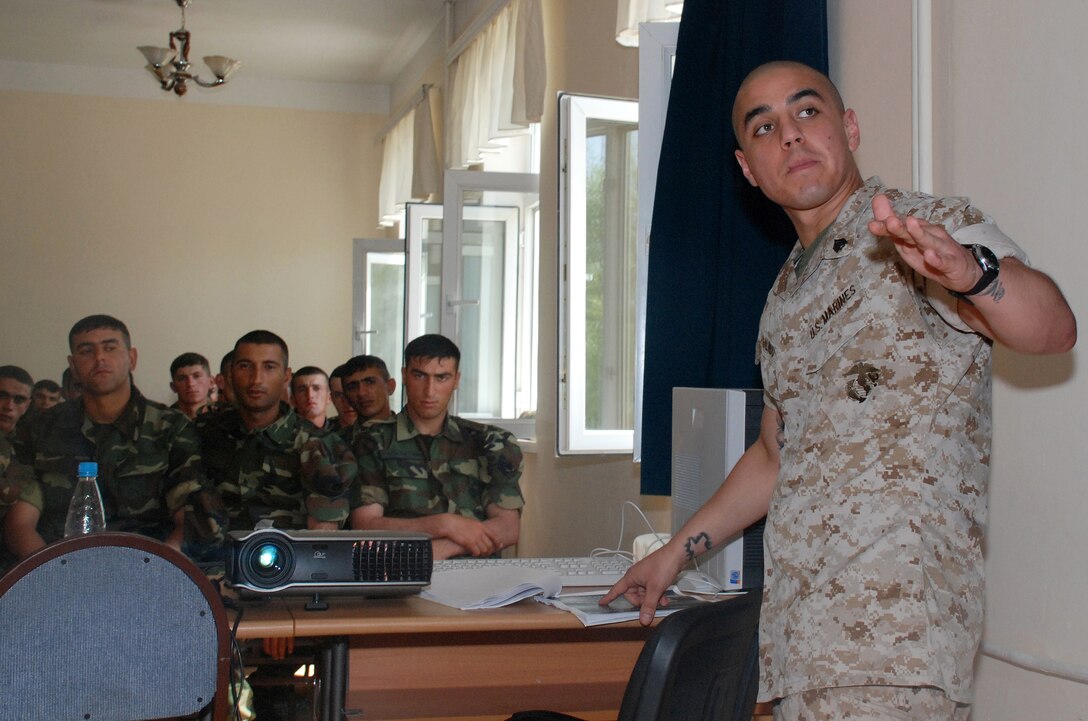 Sgt. Shawn Galindo, Marine Forces Africa administrative operations noncommissioned officer and Odessa, Texas native, highlights a topic during a leadership development class. Marine mobile training teams from Marine Forces Europe have been working with the Azerbaijani Army for more than three years to develop and strengthen NCO leadership.