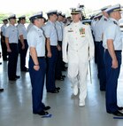 Outgoing MSST Miami (91114) commander Lt. Cmdr. Jonathan D. Theel inspects the crew one last time prior to relinquishing command to Lt. Cmdr. Bryan E. Clampitt on June 11.  Lt. Cmdr. Theel is transferring to the U.S. Marine Corps Command and Staff College in Quantico Va., after commanding MSST Miami since June 2006. (U.S. Air Force photo/Tim Norton)