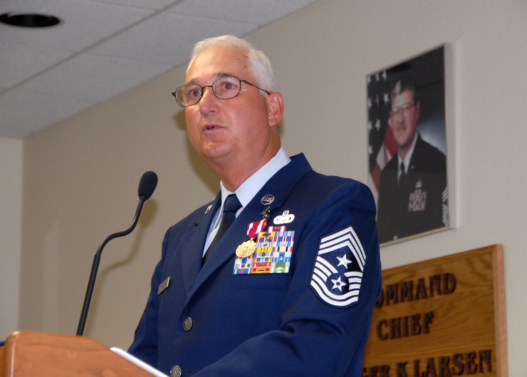 Command Chief Master Sgt. Larry Seibel speaks to the audience during his retirement celebration on June 7, 2009.  U.S. Air Force photo by Senior Master Sgt. Eric Peterson.