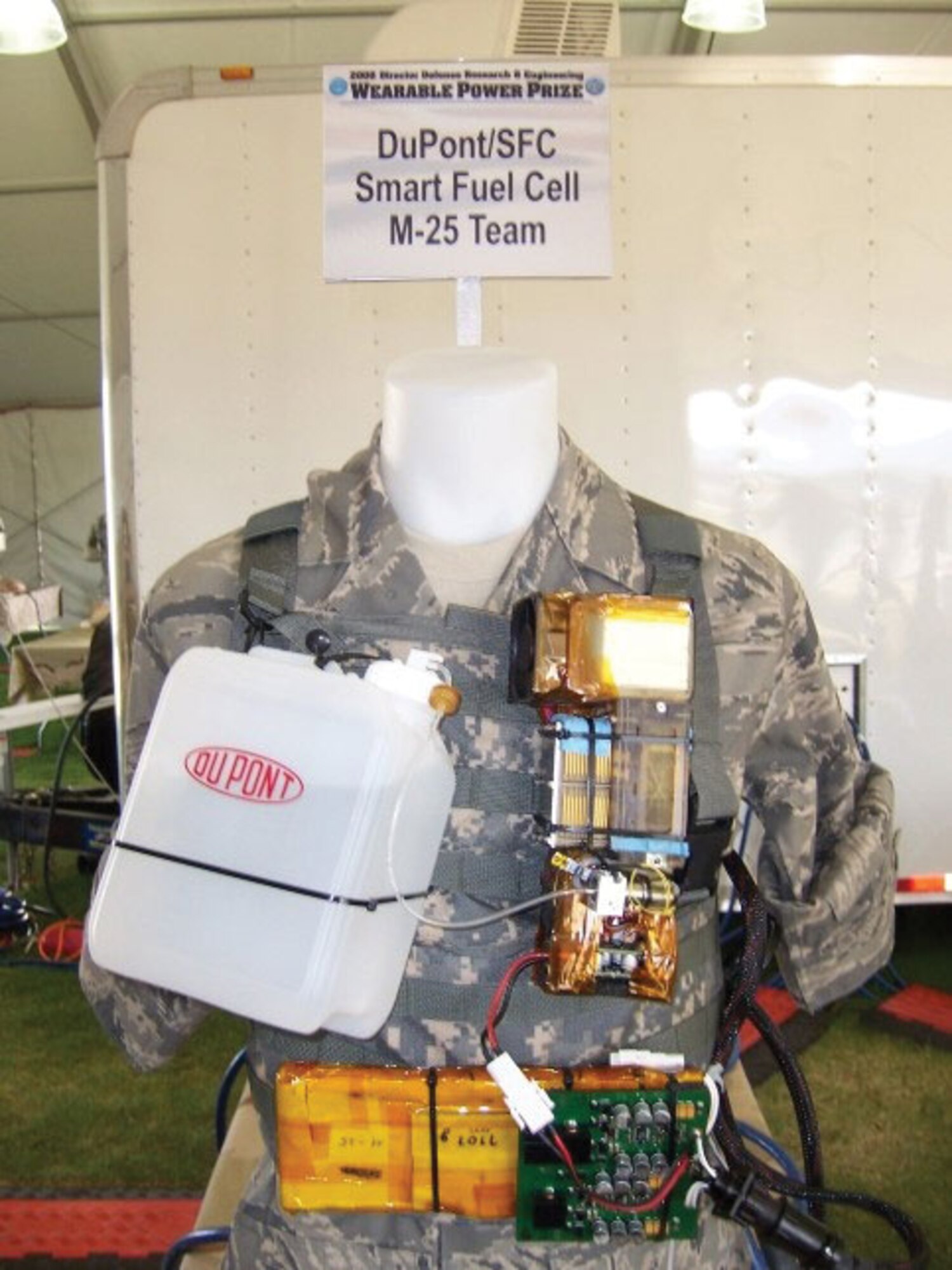 AFRL engineers assisted final testing of wearable power systems built by contestants in a Department of Defense technology development competition.  Taking first with their M-25 Land Warrior Soldier Power Generator were DuPont Fuel Cells and Smart Fuel Cell AG (AFRL image).