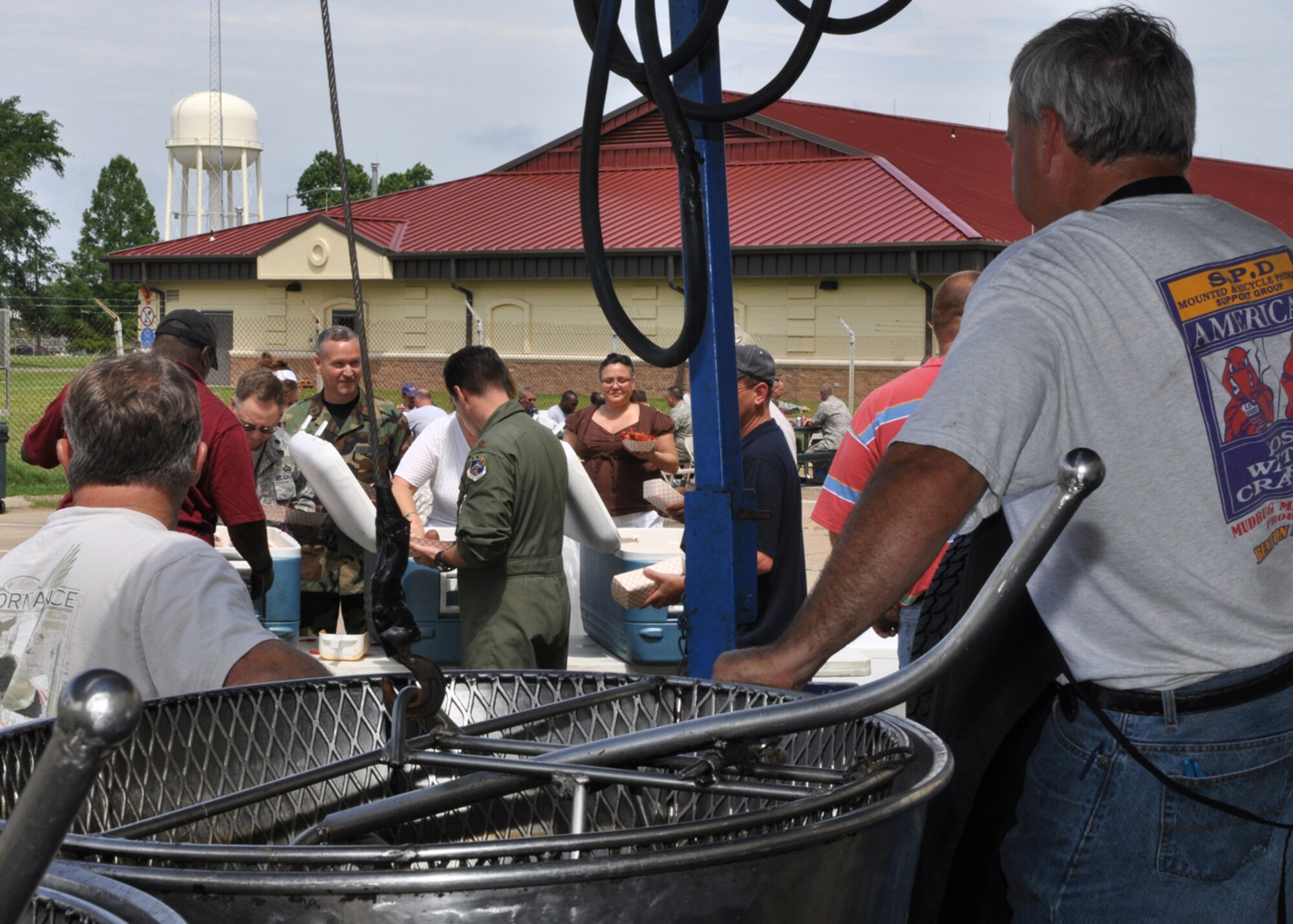 Airmen from the 917th Wing at Barksdale Air Force Base, La., enjoy a crawfish luncheon June 10, 2009. The luncheon was sponsored by Mr. Boyd Parker and the Shreveport Rubber and Gasket Company in “appreciation for what Barksdale Air Force Base does for the freedom we enjoy.” The menu consisted of crawfish, new potatoes, corn on the cob and soda pop.  (U.S. Air Force photo/Tech. Sgt. Jeff Walston)