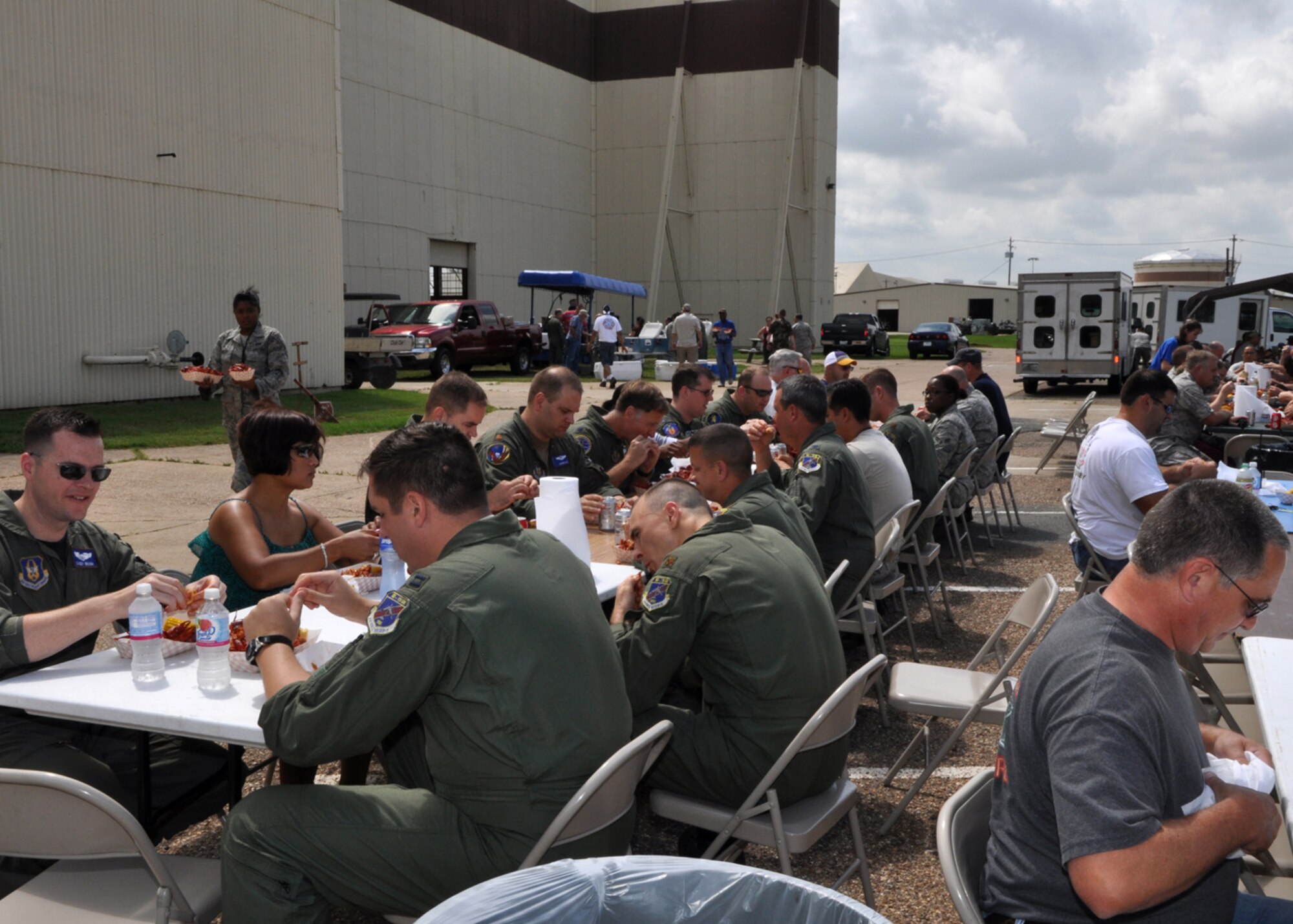 Airmen from the 917th Wing at Barksdale Air Force Base, La., enjoy a crawfish luncheon June 10, 2009. The luncheon was sponsored by Mr. Boyd Parker and the Shreveport Rubber and Gasket Company in “appreciation for what Barksdale Air Force Base does for the freedom we enjoy.” The menu consisted of crawfish, new potatoes, corn on the cob and soda pop.  (U.S. Air Force photo/Tech. Sgt. Jeff Walston)