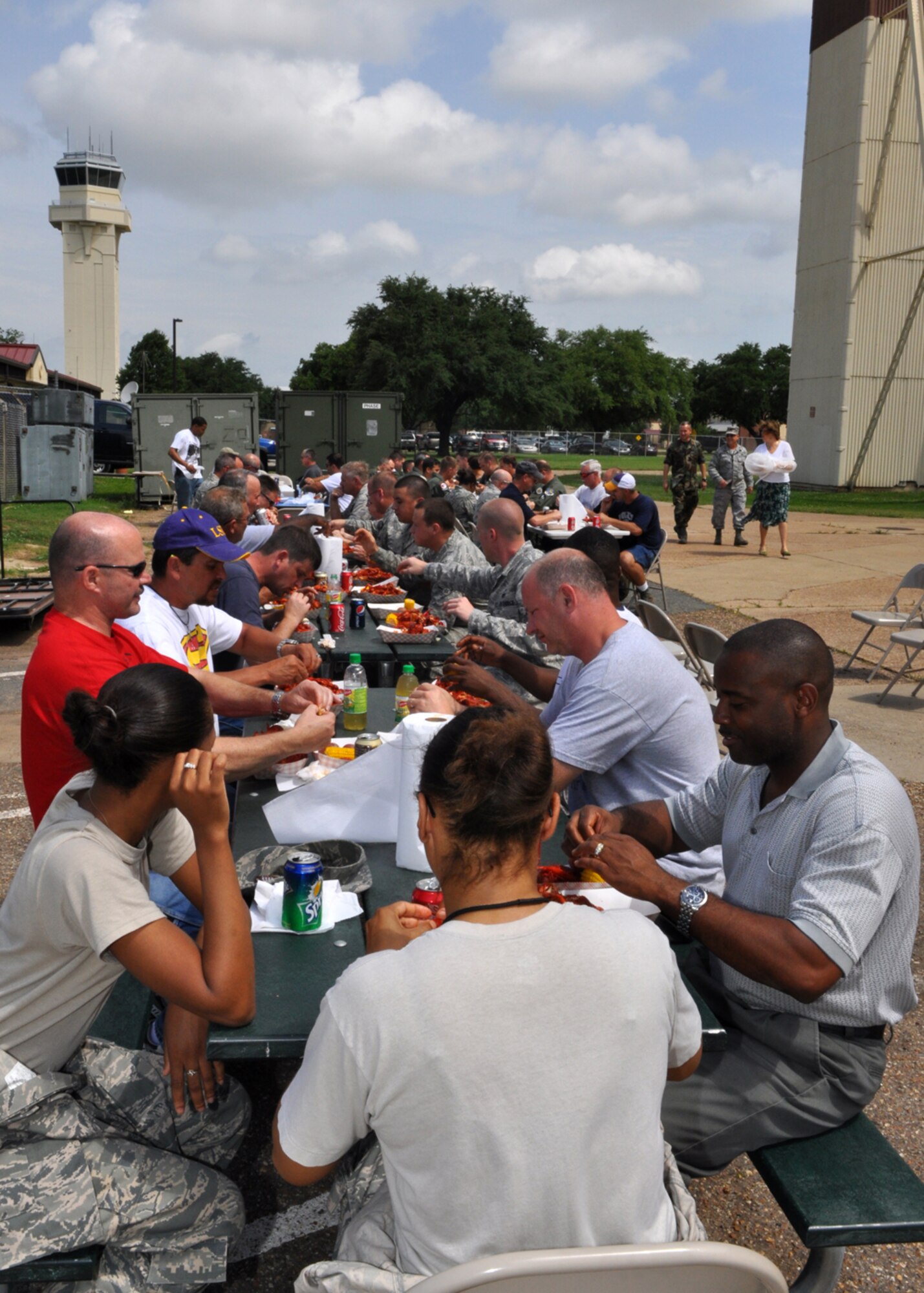 Airmen from the 917th Wing at Barksdale Air Force Base, La., enjoy a crawfish luncheon June 10, 2009. The luncheon was sponsored by Mr. Boyd Parker and the Shreveport Rubber and Gasket Company in “appreciation for what Barksdale Air Force Base does for the freedom we enjoy.” The menu consisted of crawfish, new potatoes, corn on the cob and soda pop.  (U.S. Air Force photo/Tech. Sgt. Jeff Walston)