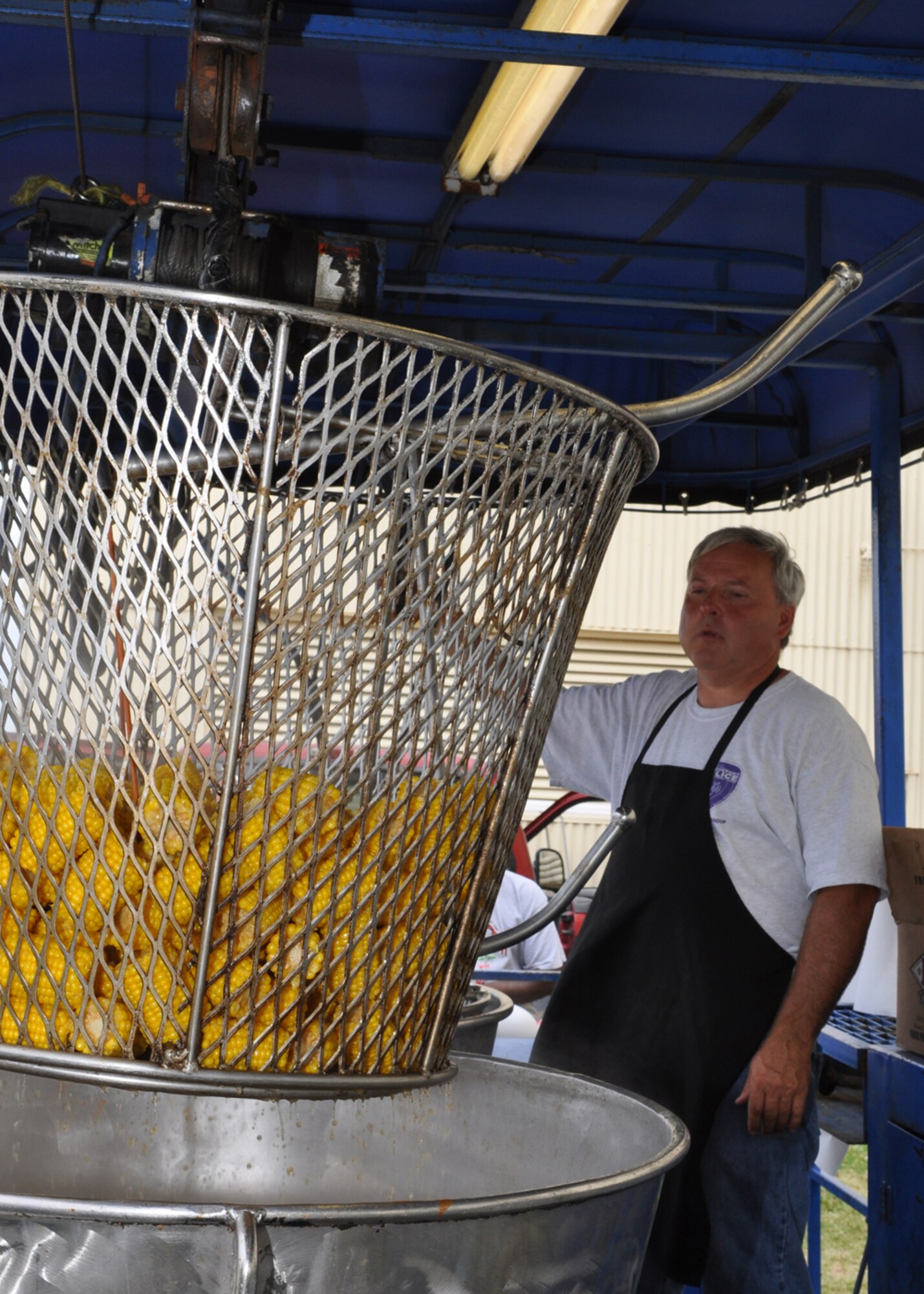 Randy Norman, who is a cook with Shavers Crawfish and Catering in Shreveport, La., boils off a batch of corn on the cobs to serve at the crawfish luncheon for 917th Wing Airmen at Barksdale Air Force Base, La., June 10, 2009. The luncheon was sponsored by the Shreveport Rubber and Gasket Company in “appreciation for what Barksdale Air Force Base does for the freedom we enjoy.” (U.S. Air Force photo/Tech. Sgt. Jeff Walston) 
