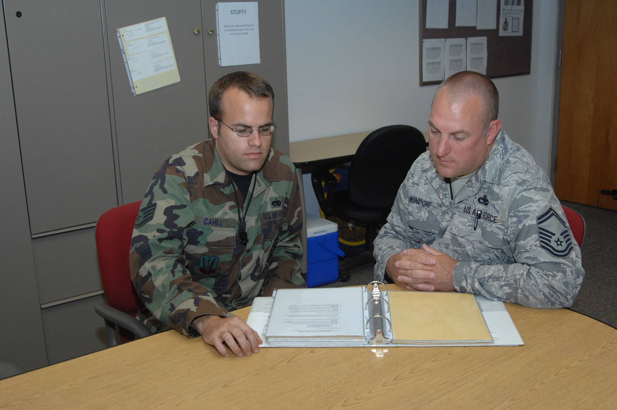 Senior Master Sgt. Steven Windorf, 509th Maintenance Group Quality Assurance Superintendent, and Staff Sgt.  Cory Cahill, 509th Maintenance Group Crew Chief Inspector, are members of a 13-member team that utilized the Air Force Smart Operations 21 (AFSO21) process to resolve problem areas with B-2 bomber flight scheduling.   (U.S. Air Force photo/Master Sgt. Stan Coleman)

