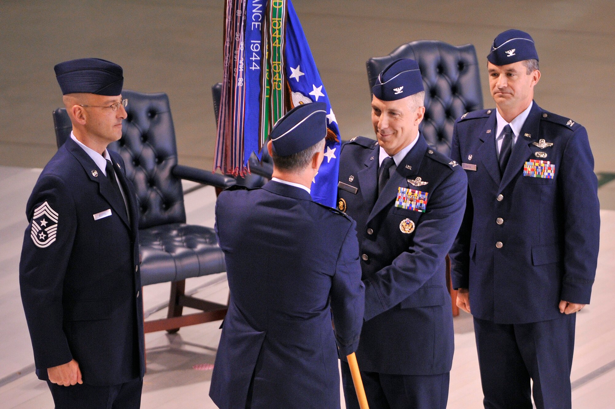U.S. Air Force Col. Thomas F. Gould receives the guidon from Maj. Gen. Mark R. Zamzow, 3rd Air Force vice commander, during the 435th Air Base Wing Change of Command ceremony, Ramstein Air Base, Germany, June 11, 2009. (U.S. Air Force photo by Staff Sgt. Stephen J. Otero)