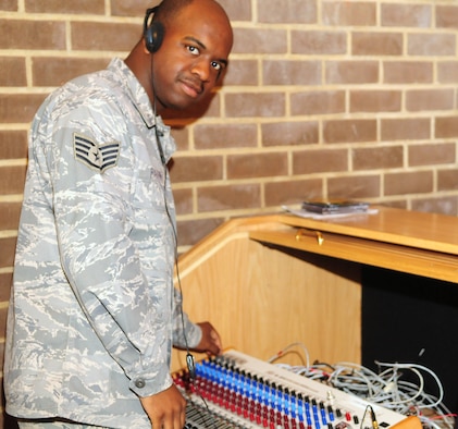 Staff Sgt. Travis Barrino tests out sound equipment June 8 at the Bolling Air Force Base main chapel as he would during a religious service. Chaplain assistants provide support for ministry by acting as carpenters, electricians, cooks, accountants and protocol experts. (U.S. Air Force photo by Airman 1st Class Susan Moreno)