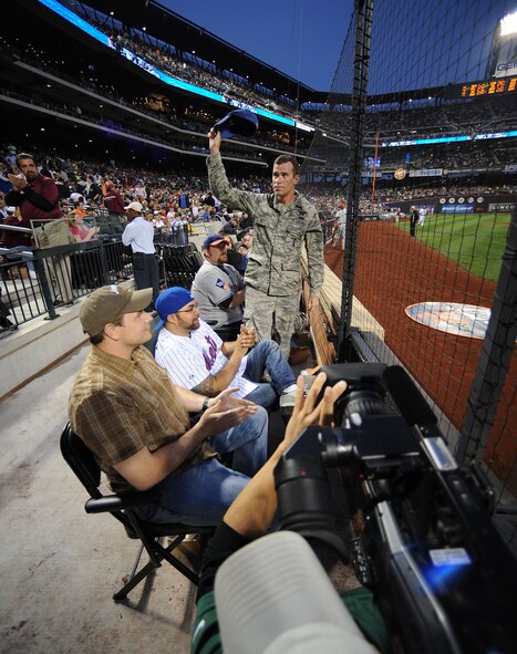 Senior Airman James J. Bavaro, 106th Aircraft Maintenance Squadron, receives a moment of appreciation for his service and safe return from deployment at a Mets, Phillies game at Citi Field in Flushing, N.Y. on June 11, 2009. Senior Airman Bavaro returned from his deployment in Afghanistan in early May and was joined at the game by three of his friends, Dave Shearer, Phil Ebel and Brendan Primus.

(U.S. Air Force Photo/Staff Sgt. David J. Murphy)
