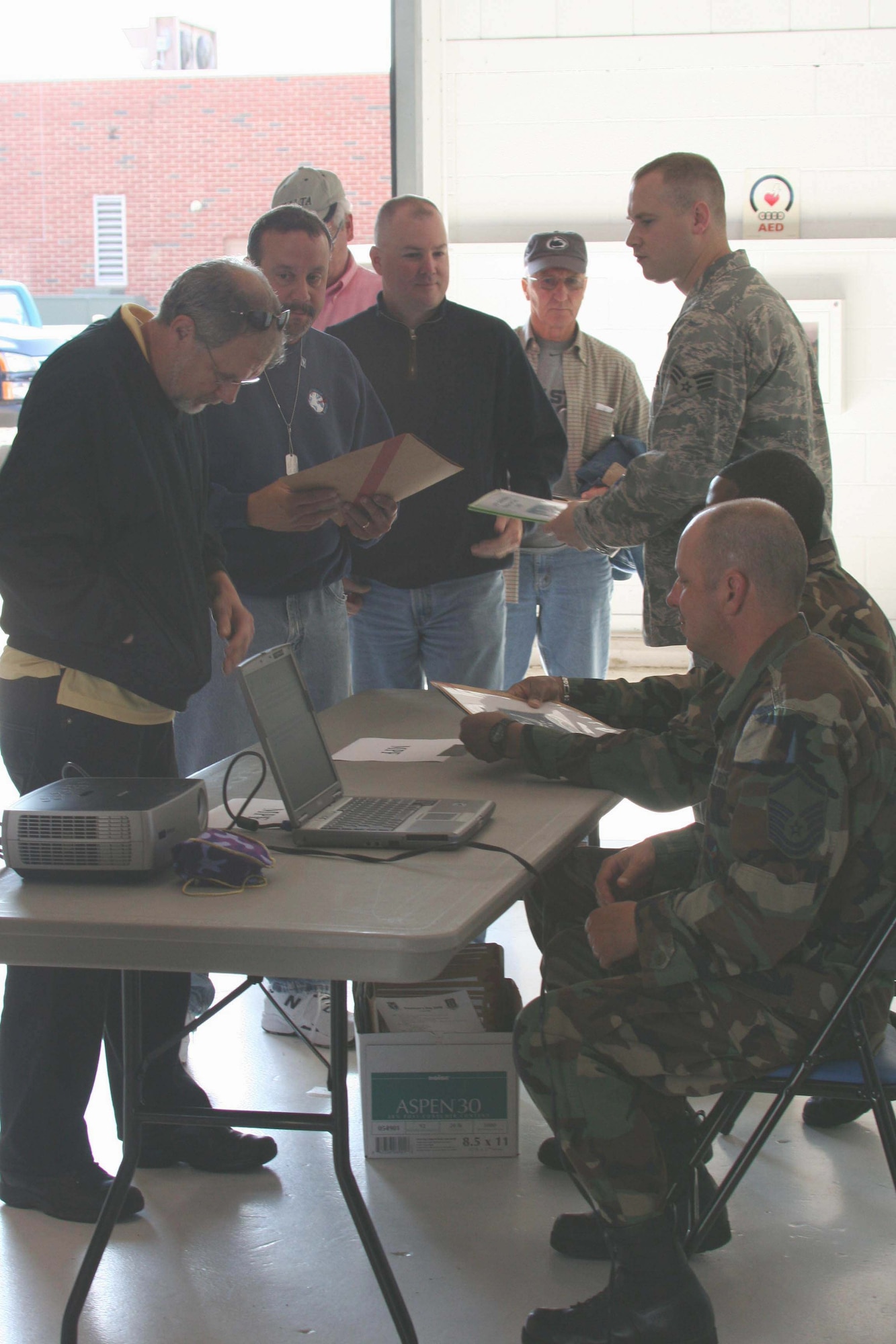 Civilian employers of Reservists here process through a staged mobility line during the June Unit Training Assembly as part of Employer's Day 2009. The employers were invited to the base to learn about the 911th Airlift Wing's mission and their employees' role in accomplishing that mission.(photo by Staff Sgt. Roberto Modelo)
