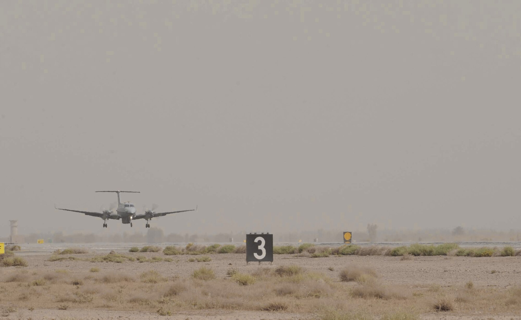 The Air Force's new MC-12 Liberty aircraft and the first one deployed in-theater lands June 8 at Joint Base Balad, Iraq. A medium-altitude manned special-mission turboprop aircraft designed for intelligence, surveillance and reconnaissance, MC-12 aircraft supports coalition and joint ground forces. (U.S. Air Force photo/Senior Airman Elizabeth Rissmiller) 
