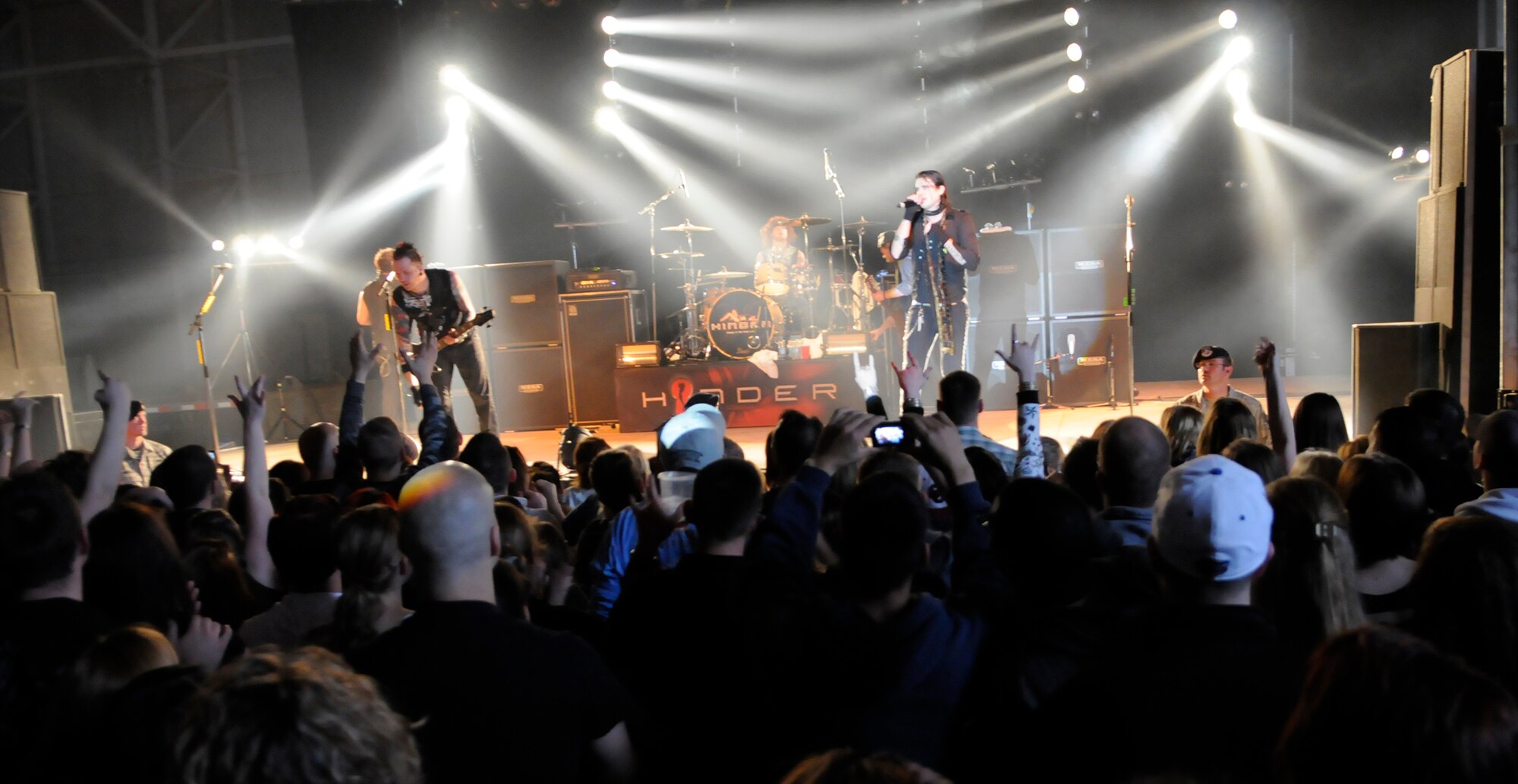 Hinder rocks out at RAF Mildenhall, June 9.  Supporters of the military, the band is touring six bases in Europe.  (U.S. Air force photo by Staff Sgt. Christopher L. Ingersoll)