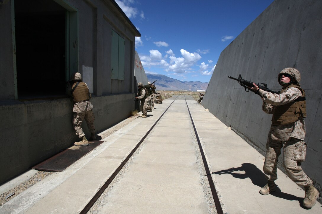 HAWTHORNE ARMY DEPOT, Nev. - U.S. Marine Corps reservists of Headquarters and Service Company, 6th Engineer Support Battalion, 4th Marine Logistics Group, conduct foot patrol training on June 11, 2009 during exercise Javelin Thrust-09.  Marine Forces Reserve (MARFORRES), headquartered in New Orleans, La., conducts exercise Javelin Thrust-09 at six locations throughout the western U.S. June 6 - 20.  This combined arms exercise will showcase a wide range of combat and logistics capabilities, and allow leaders to assess the operational readiness of participating units.  More than 3000 reserve and active component Marines, and members of the U.S. Navy, U.S. Army and Air National Guard, will train simultaneously in support of this exercise at the following locations: Hawthorne Army Weapons Depot, in Hawthorne, Nev.; Naval Air Station Fallon, in Fallon, Nev.; Marine Corps Mountain Warfare Training Center in Bridgeport, Calif.; Ft. Hunter Liggett, Calif.; Ft. Hood, Texas; and the Marine Corps Air Ground Combat Center in Twentynine Palms, Calif.  (U.S. Marine Corps photo by Lance Cpl. Abby Burtner, MARFORRES COMCAM) (Released)