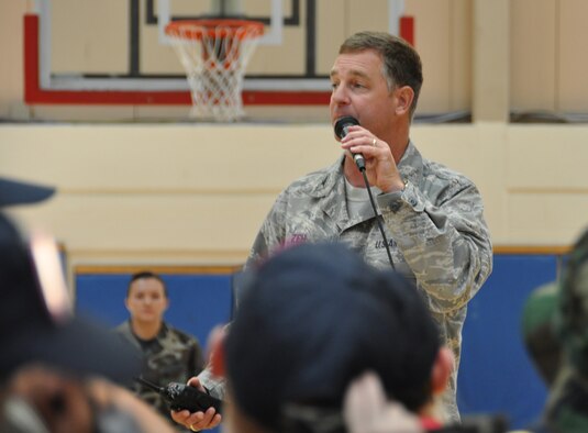 Col. David Zeh, 325th Mission Support Group commander, rallies his "troops" before they head to their "deployment" during the Opeation Junior R.A.P.T.O.R. program June 12 at Tyndall Air Force Base, Fla. The "troops" -- children of military parents -- were at OJR to experience what Mom and or Dad do when preparing to deploy; more than 100 children took part in the day. (U.S. Air Force photo/Staff Sgt. Joshua Stevens)