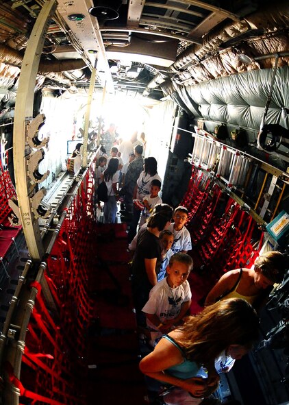 DYESS AIR FORCE BASE, Texas -- During the first chalk of the Operation Dyess Kids program June 12, the children toured the inside of a C-130. They “flew” to Madagascar for their deployed location. (U.S. Air Force photo by Airman 1st Class Stephen Reyes)