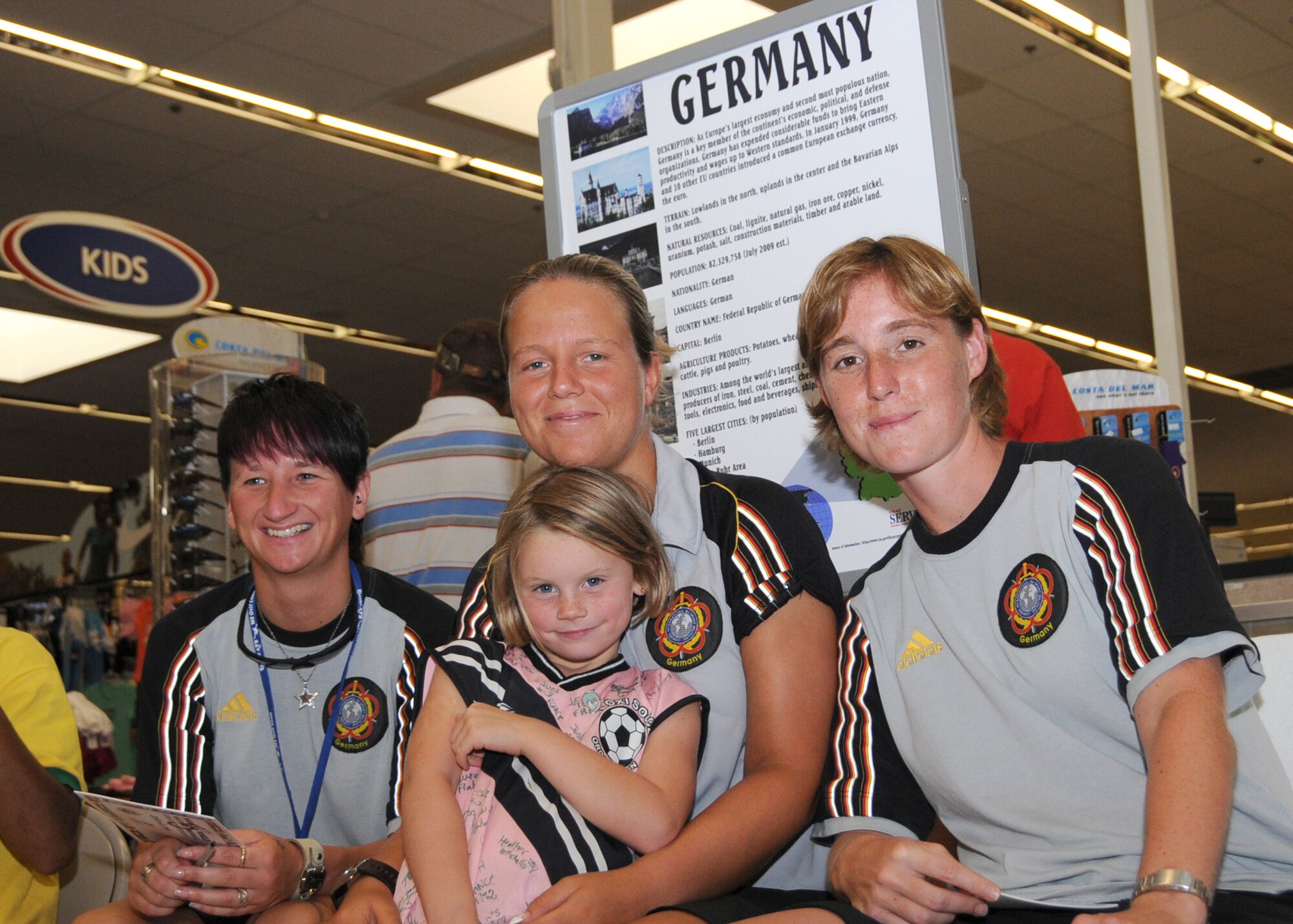 Members from teams attending the the 5th CISM Women’s Soccer Championship, hosted by Keesler Air Force base, sign autographs and participate in sport clinics June 12 at the soccer field on base and Academy Sports. Teams from Brazil, Canada, France, Germany, The Netherlands, The Republic of South Korea and The United States attended the clinics and autograph sessions and demonstrated some fundamentals of soccer.  (U.S. Air Force photo by Kemberly Groue)