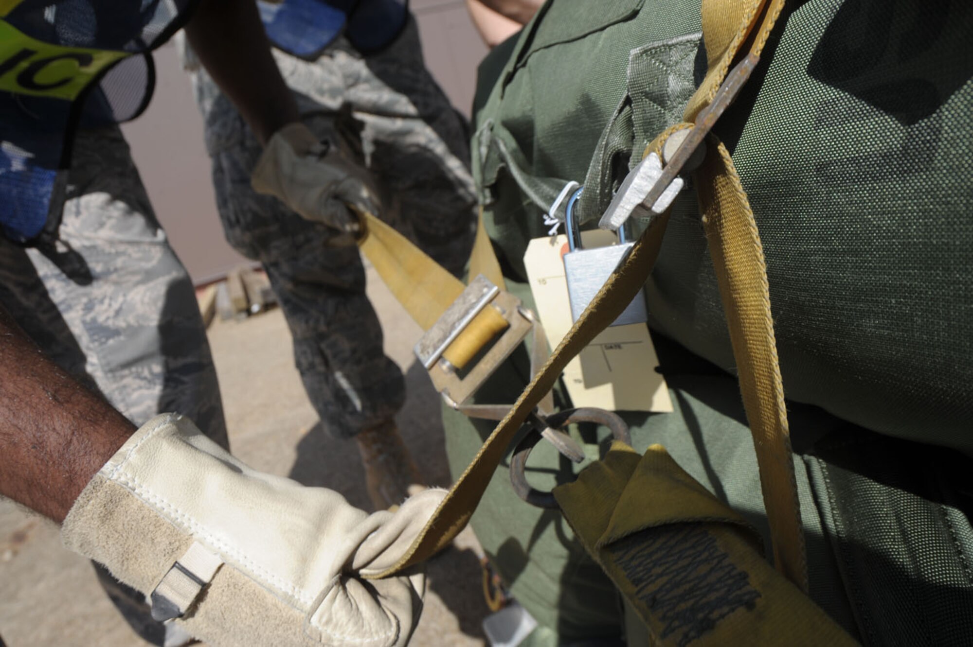 LANGLEY AIR FORCE BASE, Va. – Airmen of the 1st Medical Group secure a pallet during an Operational Readiness Exercise here June 12.  The June 2009 Phase I ORE was conducted to test and prepare Langley Airmen for future deployments.  (U.S. Air Force photo/Staff Sgt. Barry Loo)