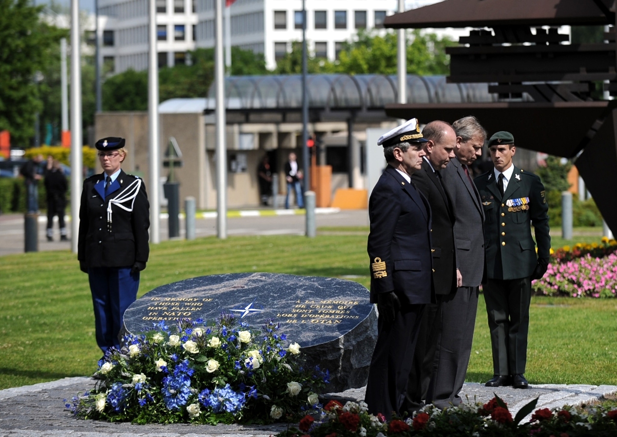 NATO officials dedicate a memorial June 12 to those who have lost their lives in alliance operations during a ceremony at NATO headquarters in Brussels, Belgium. (Defense Department photo/Master Sgt. Jerry Morrison)