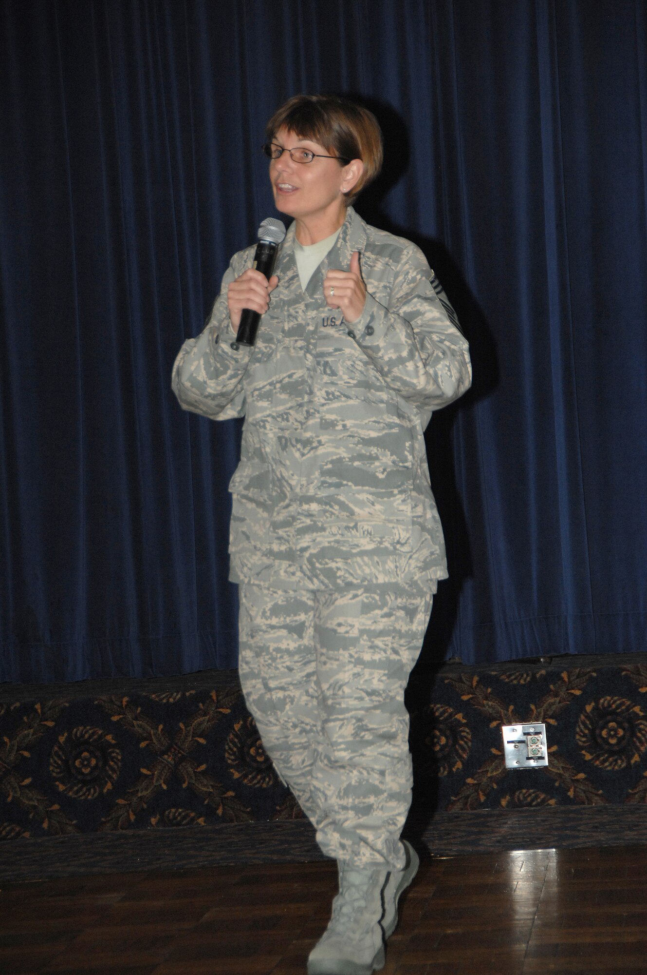 OFFUTT AIR FORCE BASE, Neb. -- 55th Wing Command Chief Master Sgt. Lisa Sirois explains recent changes to U.S. Air Force regulations to Airmen during a recent enlisted call at the Patriot Club June 10. Enlisted calls are one of many avenues for wing leadership to inform unit members and receive feedback. 
Air Force Photo by D. P. Heard