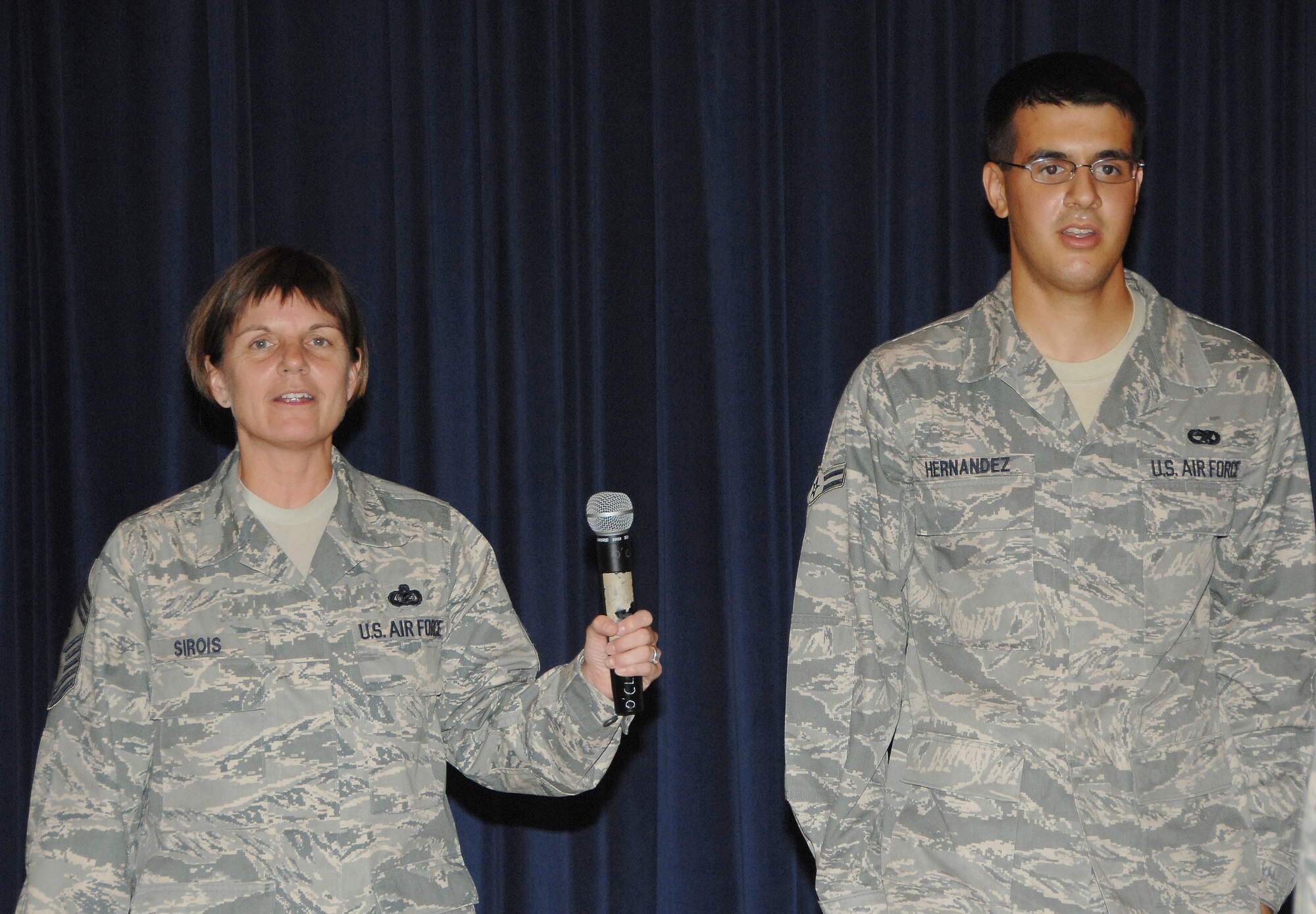 OFFUTT AIR FORCE BASE, Neb. -- 55th Wing Command Chief Master Sgt. Lisa Sirois and Airman 1st Class Chris D. Hernandez, 55th Communications Squadron, recite the Airmen's Creed during a recent enlisted call at the Patriot Club June 10. Enlisted calls are one of many avenues for wing leadership to inform unit members and receive feedback. 
Air Force Photo by D. P. Heard
