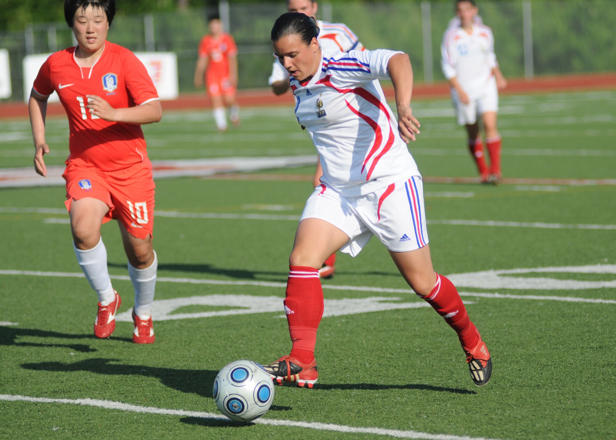 France and The Republic of South Korea compete during the 5th CISM Women’s Soccer Championship at the Gulfport Sports Complex 11 June.  The CISM tournament, hosted by Keesler Air Force Base, includes teams from Brazil, Canada, France, Germany, The Netherlands, The Republic of South Korea and the United States.  Matches are being held June 6 to 13, with the Gold match June 13 at 2 p.m.  Organizers say the tournament gives teams and people who attend a chance to develop bonds and life-long friendships between the countries and a chance to learn about one another’s cultural similarities and differences.  (U.S. Air Force photo by Kemberly Groue)