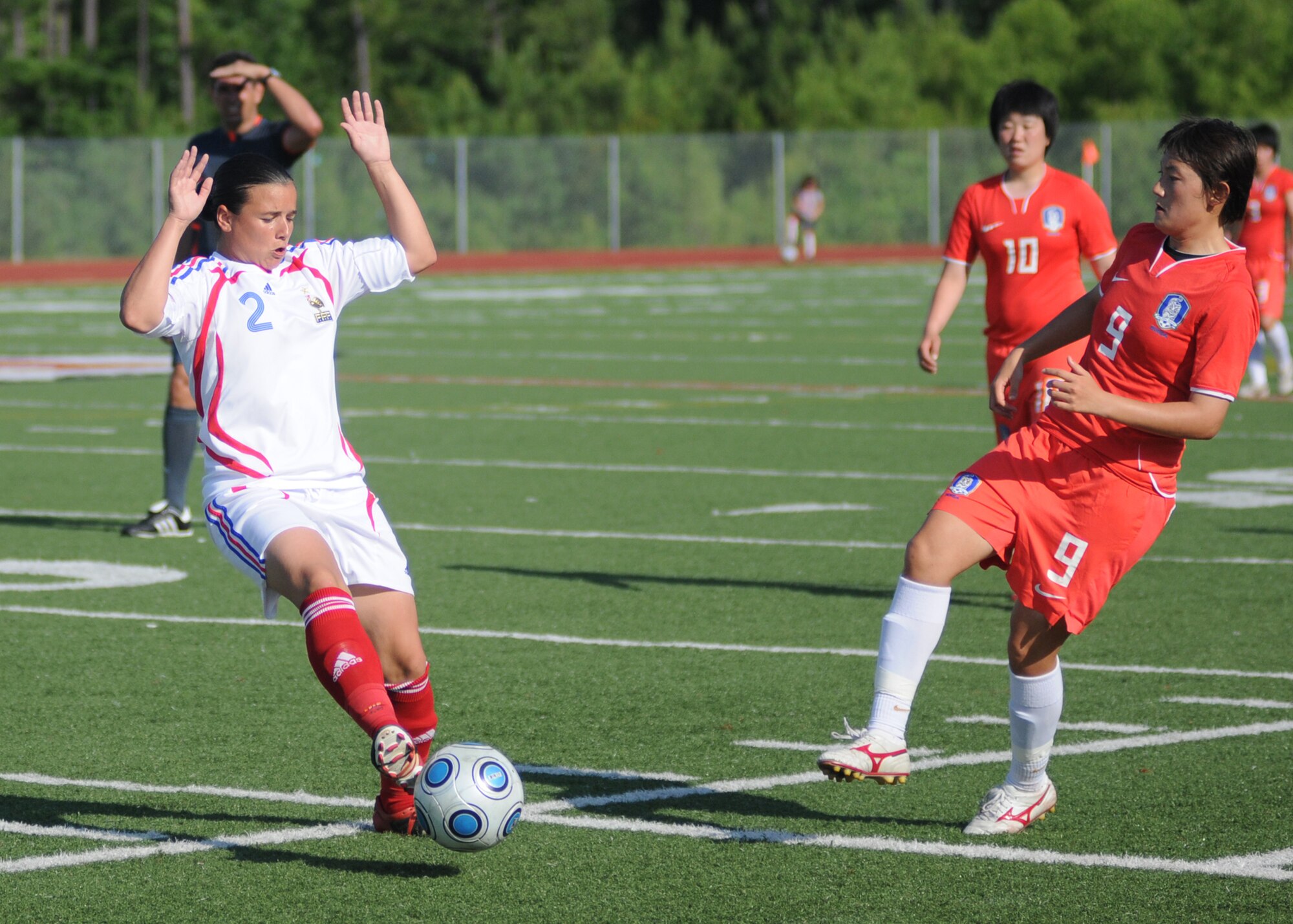 France and The Republic of South Korea compete during the 5th CISM Women’s Soccer Championship at the Gulfport Sports Complex 11 June.  The CISM tournament, hosted by Keesler Air Force Base, includes teams from Brazil, Canada, France, Germany, The Netherlands, The Republic of South Korea and the United States.  Matches are being held June 6 to 13, with the Gold match June 13 at 2 p.m.  Organizers say the tournament gives teams and people who attend a chance to develop bonds and life-long friendships between the countries and a chance to learn about one another’s cultural similarities and differences.  (U.S. Air Force photo by Kemberly Groue)