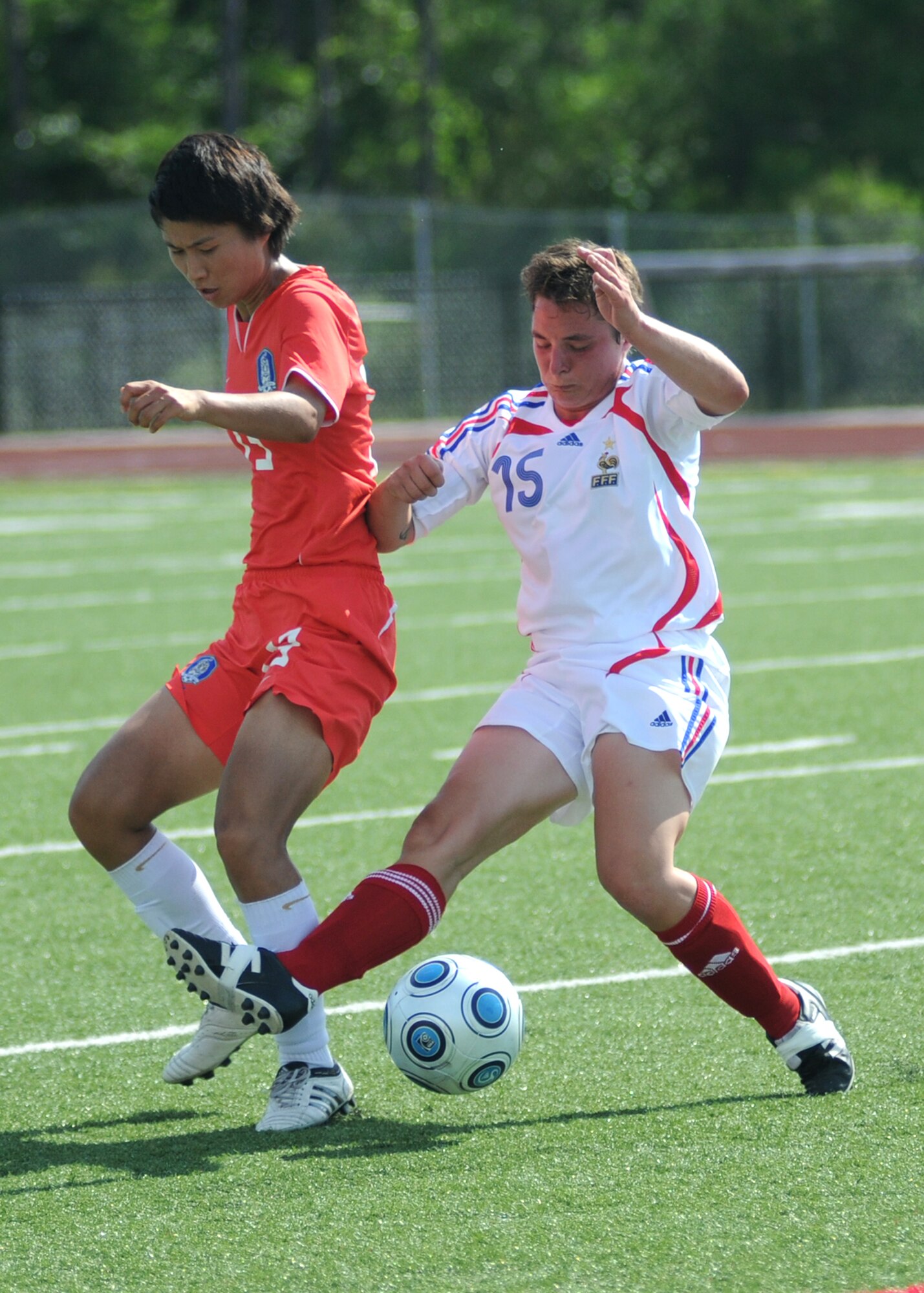 France and The Republic of South Korea compete during the 5th CISM Women’s Soccer Championship at the Gulfport Sports Complex 11 June.  The CISM tournament, hosted by Keesler Air Force Base, includes teams from Brazil, Canada, France, Germany, The Netherlands, The Republic of South Korea and the United States.  Matches are being held June 6 to 13, with the Gold match June 13 at 2 p.m.  Organizers say the tournament gives teams and people who attend a chance to develop bonds and life-long friendships between the countries and a chance to learn about one another’s cultural similarities and differences.  (U.S. Air Force photo by Kemberly Groue)