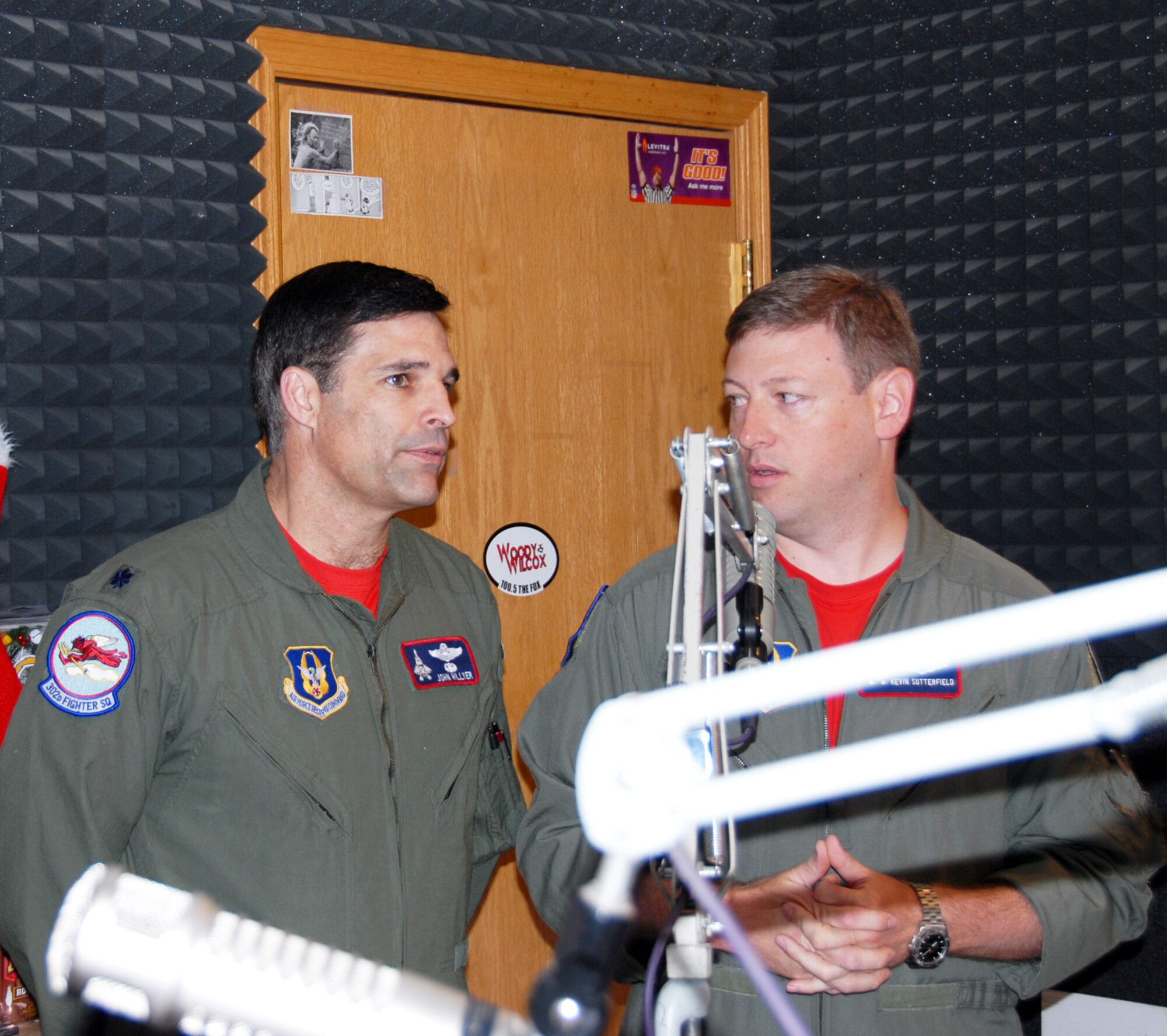 ELMENDORF AIR FORCE BASE, Alaska – Reserve F-22A Raptor pilots Lt. Col. John Hillyer and Maj. Kevin Sutterfield gave live on-air radio interviews to disc jockeys at local Anchorage radio stations June 11. The two pilots from Air Force Reserve Command’s 477th Fighter Group discussed the upcoming joint training exercise Northern Edge 2009. U.S. military units stationed in the Continental United States and the Pacific Theater will participate in the joint training exercise June 15-26 on and above central Alaska ranges and the Gulf of Alaska. Northern Edge is one in a series of U.S. Pacific Command exercise in 2009 that prepare joint forces to respond to crises in the Asian Pacific Region. The exercise is designed to sharpen their skills, to practice operations, techniques, and procedures, to improve command, control and communication relationships, and to develop interoperable plans and programs. Approximately 9,000 U.S. Active Duty and Reserve component Soldiers, Sailors, Airmen, and marines will participate with more than 200 aircraft from all the services. Northern Edge is the largest military training exercise scheduled in Alaska this year with virtual and constructive participants covering nine time zones exercising alongside live players. (U.S. Air Force photo/Staff Sgt. Andrea Knudson)