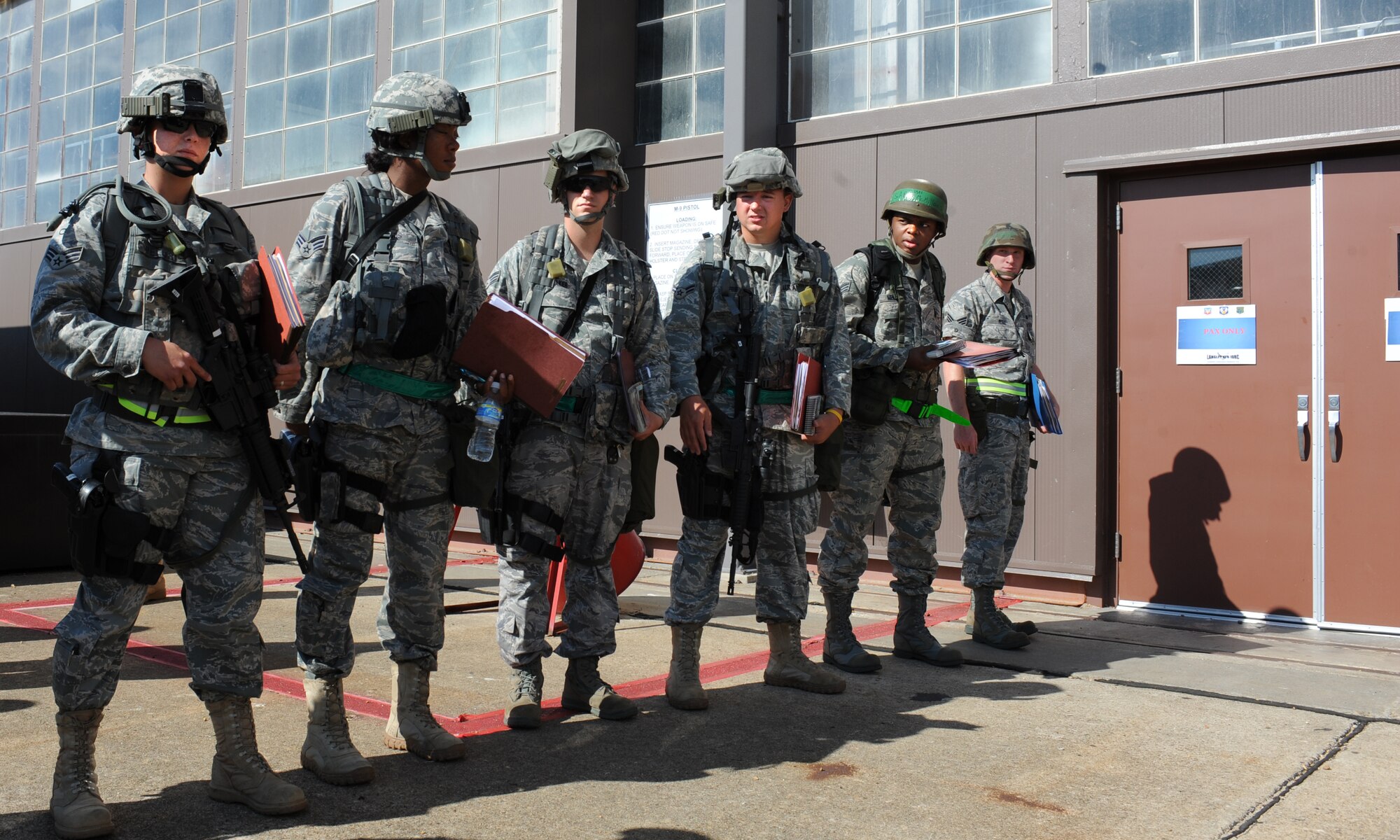 LANGLEY AIR FORCE BASE, Va. -- Airmen prepare for an Operational Readiness Exercise pre-deployment briefing June 12. The June 2009 Phase I ORE was conducted to test and prepare Langley Airmen for future deployments. (U.S. Air Force photo/Airman 1st Class Gul Crockett)
