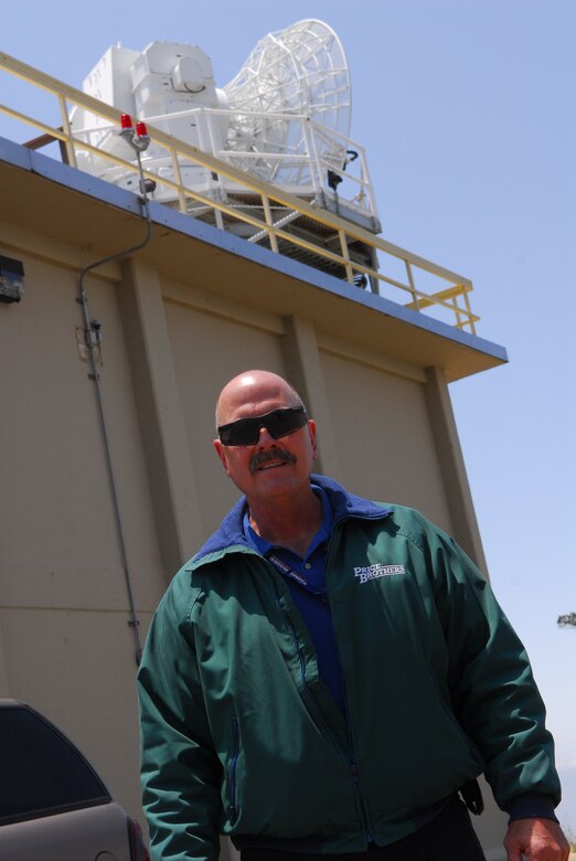 VANDENBERG AIR FORCE BASE, Calif. – Rod Kennedy, an Indyne radar department manager, stands before a two-story building used to anchor the FPS-16 Radar here June 9.  The radar is used to provide data and track missiles during launches. This radar, along with its data system, will be tracking the upcoming June 29 Minuteman III launch to direct the missile and ensure its direction is not altered. (U.S. Air Force photo/Airman 1st Class Steve Bauer)