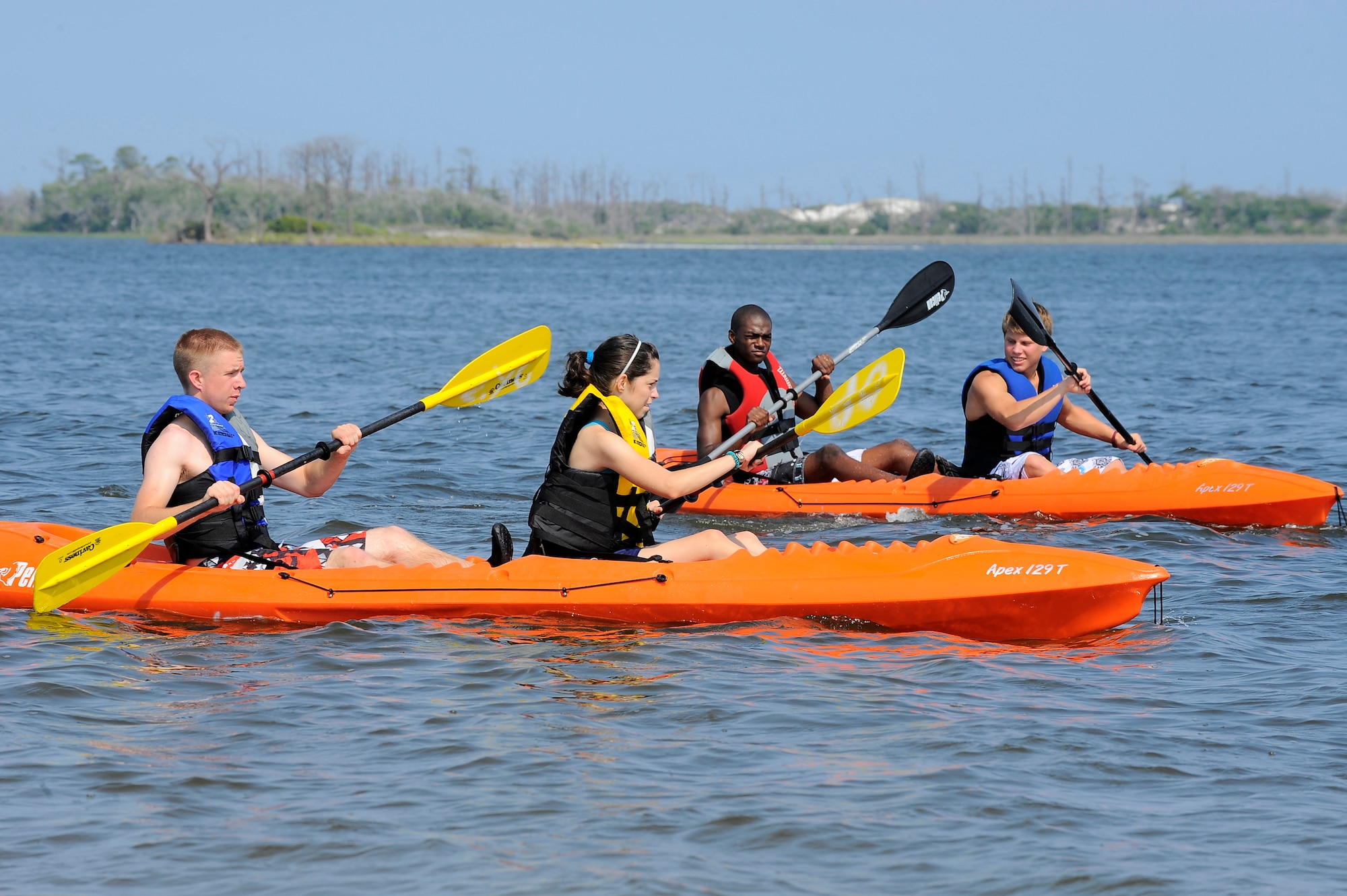 HURLBURT FIELD, Fla. ? Participants of Operation Purple practice kayaking on the Sound June 9, 2009. The volunteers were participating in an eight day team building and leadership camp. Half the volunteers will become mentors for future Operation Purple camps. Operation Purple is an eighteen day team camp for children whose parents are deployed. (U.S. Air Force photo/Senior Airman Jason Epley)