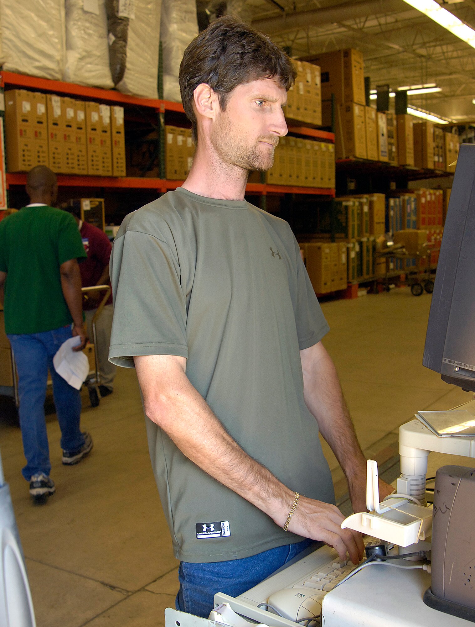 David Lukinbill works for the Army and Air Force Exchange Service at Tinker, receiving merchandise from vendors, but for the past four-and-a-half years, he has been deployed to Iraq. He stayed because he liked the challenge.(Air Force photo/ Margo Wright) 