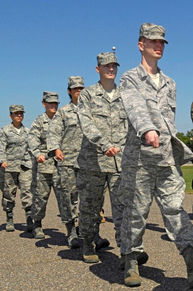 Airmen practice drill as part of the requirements of attending Airman Leadership School June 5. ALS is a five-week course designed to enhance senior airman's leadership skills in order to be more effective supervisors. (U.S. Air Force photo by Airman 1st Class Allison Boehm)