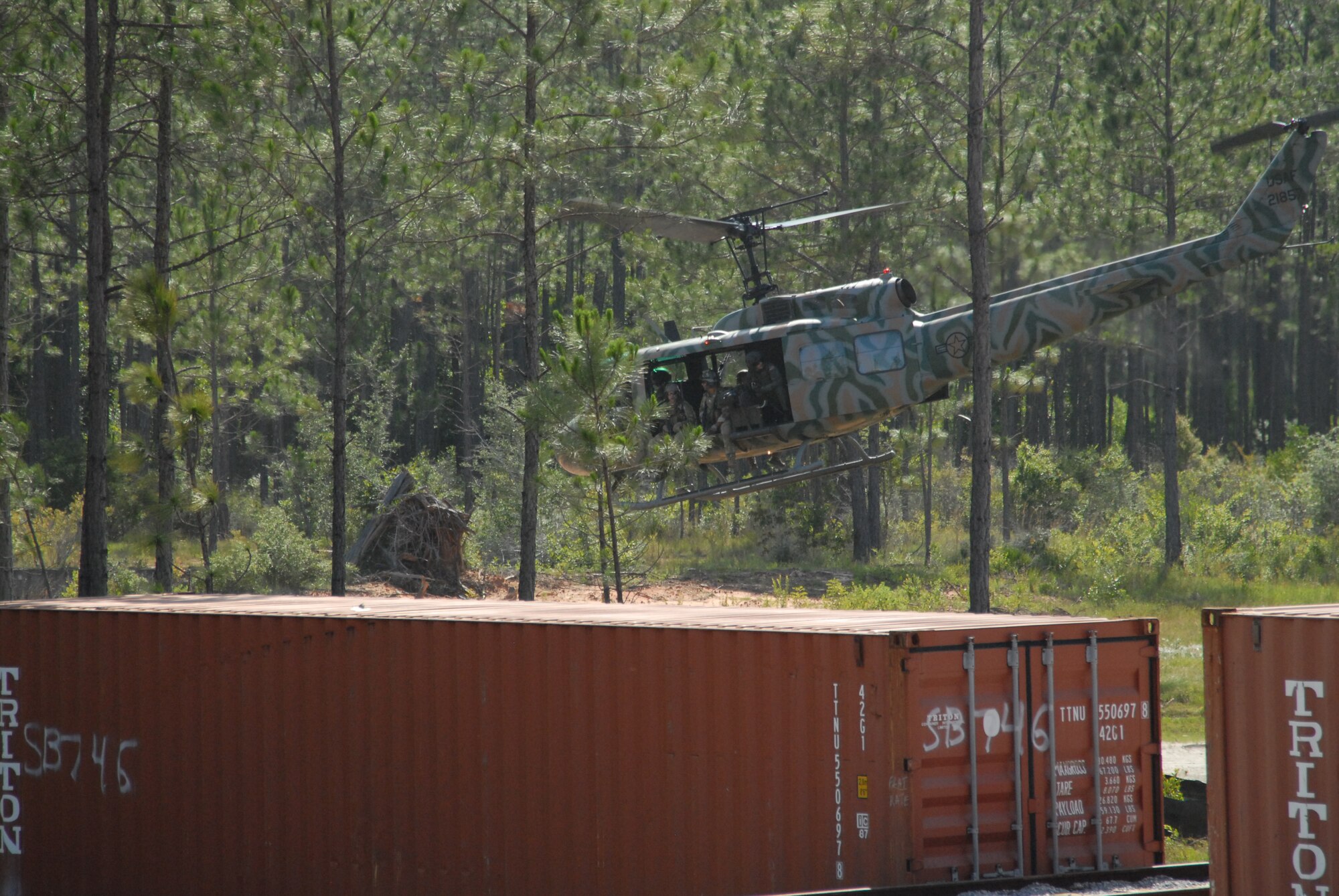 Hurlburt Field, Fla.-- Members from a special operations unit demonstrate an exfil during the ribbon-cutting ceremony of the SERE Urban and Integrated Urban Joint Close Air Support Target Sets, Jun 8. (U.S. Air Force photo released by Staff Sgt. Orly N. Tyrell).