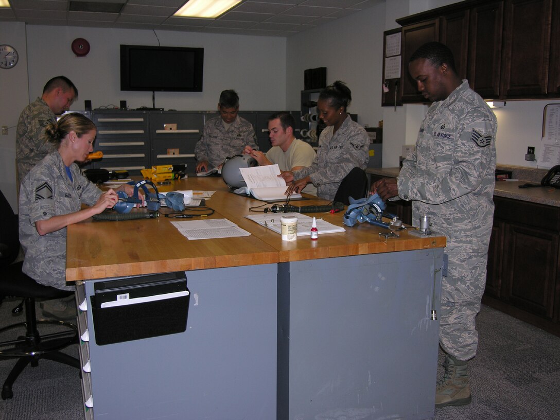 SEYMOUR JOHNSON AIR FORCE BASE, N.C. -- Reservists with the 916th Aircrew Flight Equipment shop demonstrate just what it takes to win command-level awards...teamwork!