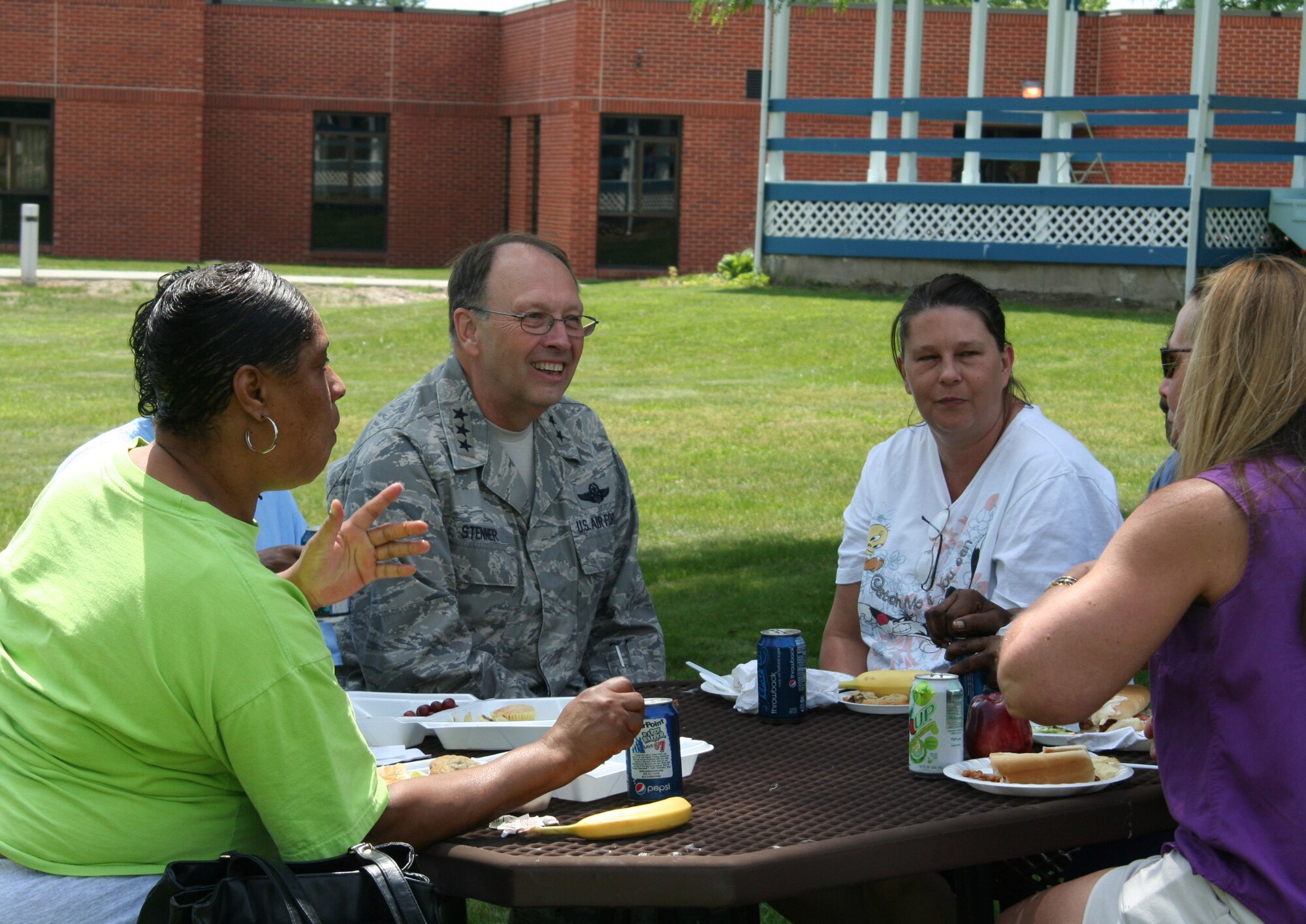 WRIGHT-PATTERSON AIR FORCE BASE, Ohio – Lt. Gen. Charles E. Stenner, Jr, Chief of Air Force Reserve and Commander, Air Force Reserve Command, talks with Veterans Administration residents June 6, at the annual Dayton VA Medical Center picnic.  The VA visit was part of General Stenner's first visit to the 445th Airlift Wing. The general had breakfast with Airmen, hosted a commander's call and spoke at the unit's military ball while here. (Air Force photo/Senior Airman Robert Nelson)