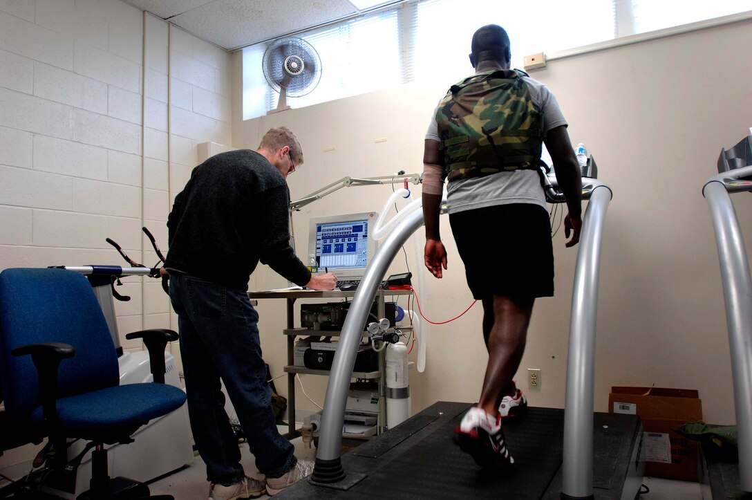 Pvt. Phillip Faulkner, a soldier research volunteer, walks May 6, 2009, on a treadmill as part of a study by the U.S. Army Research Institute of Environmental Medicine, Natick, Mass. The lab is studying the use of natural supplements to improve physical performance. Much of the institute’s research is conducted using data collected from soldiers recruited to take part in the studies.
