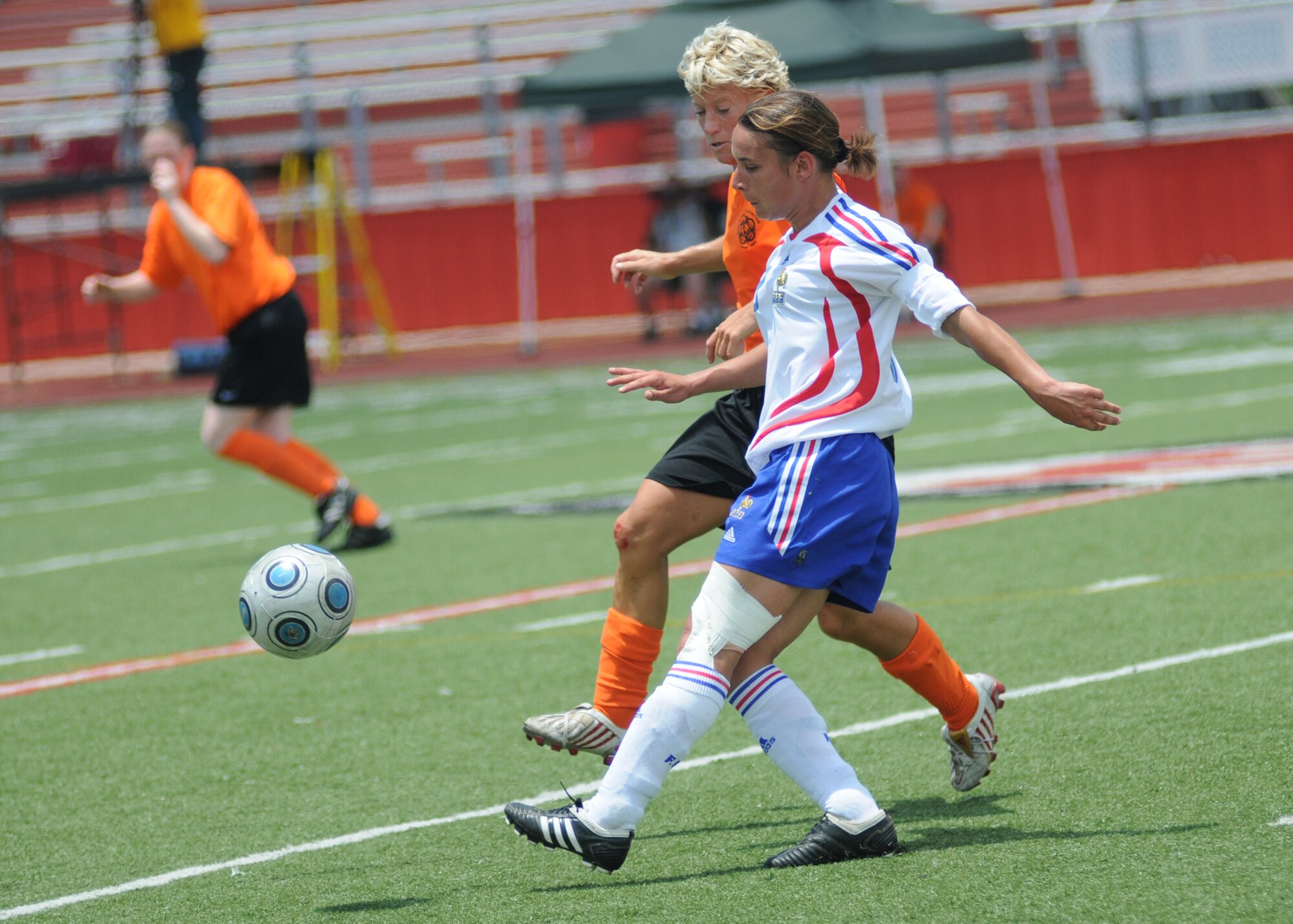 In a match that went into overtime, The Netherlands held on to win the bronze medal over France, 2-1, during the final day of the 5th CISM Women’s Soccer Championship at the Biloxi High Stadium, June 13.  The CISM tournament, hosted by Keesler Air Force Base, also included teams from Germany, Canada Brazil, the Republic of South Korea and the United States.   The Brazilian team won the gold medal and Korea earned the silver medal. (U.S. Air Force photo by Kemberly Groue)