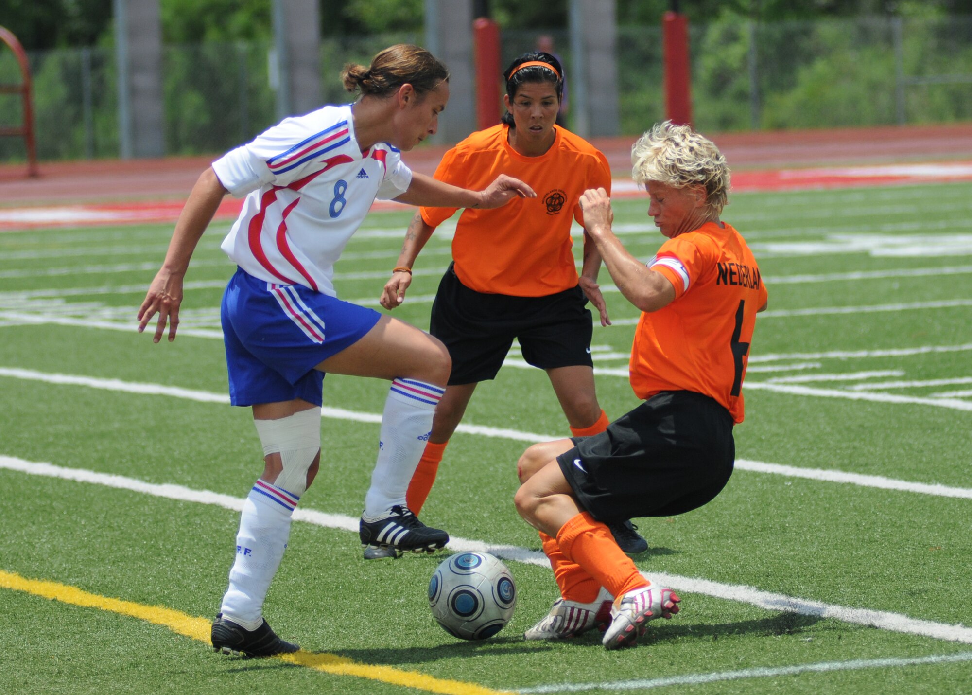 In a match that went into overtime, The Netherlands held on to win the bronze medal over France, 2-1, during the final day of the 5th CISM Women’s Soccer Championship at the Biloxi High Stadium, June 13.  The CISM tournament, hosted by Keesler Air Force Base, also included teams from Germany, Canada Brazil, the Republic of South Korea and the United States.   The Brazilian team won the gold medal and Korea earned the silver medal. (U.S. Air Force photo by Kemberly Groue)