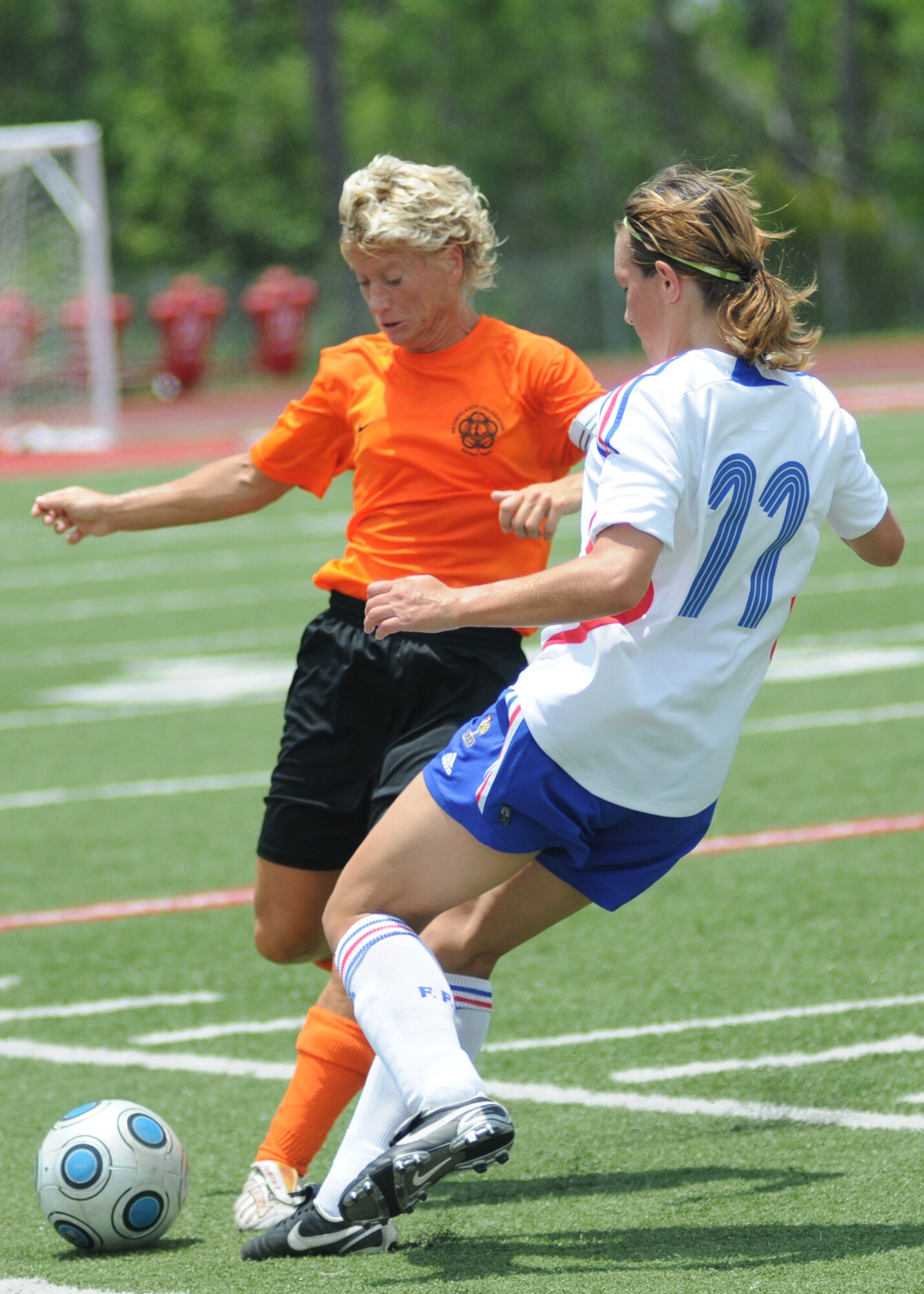 In a match that went into overtime, The Netherlands held on to win the bronze medal over France, 2-1, during the final day of the 5th CISM Women’s Soccer Championship at the Biloxi High Stadium, June 13.  The CISM tournament, hosted by Keesler Air Force Base, also included teams from Germany, Canada Brazil, the Republic of South Korea and the United States.   The Brazilian team won the gold medal and Korea earned the silver medal. (U.S. Air Force photo by Kemberly Groue)