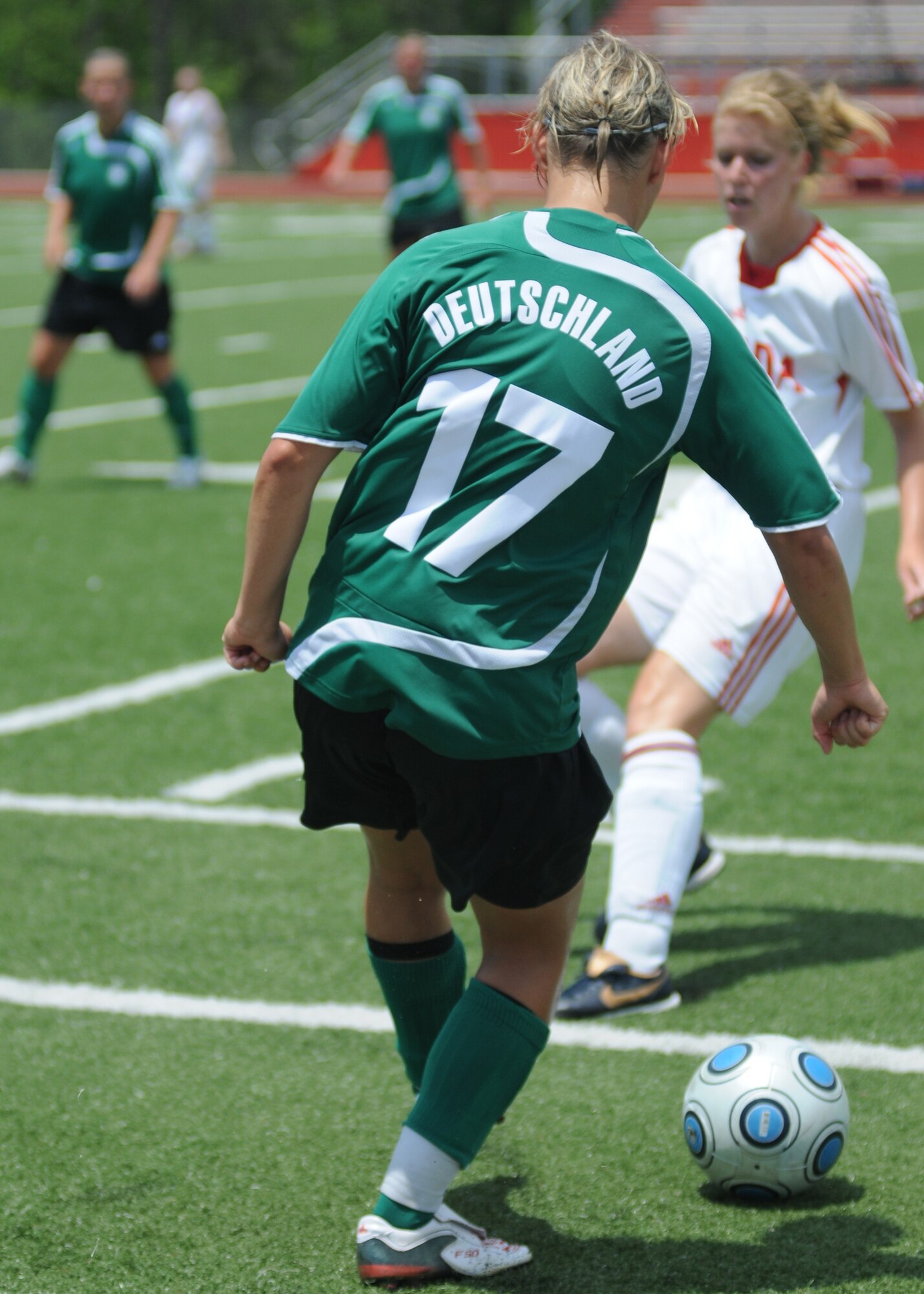 Germany took the consolation match over Canada, 4-1, during the final day of the 5th CISM Women’s Soccer Championship at the Biloxi High Stadium, June 13.  The CISM tournament, hosted by Keesler Air Force Base, also included teams from Brazil, France, The Netherlands, the Republic of South Korea and the United States.   The Brazilian team won the gold medal, Korea earned the silver medal and The Netherlands took the bronze medal.  (U.S. Air Force photo by Kemberly Groue)