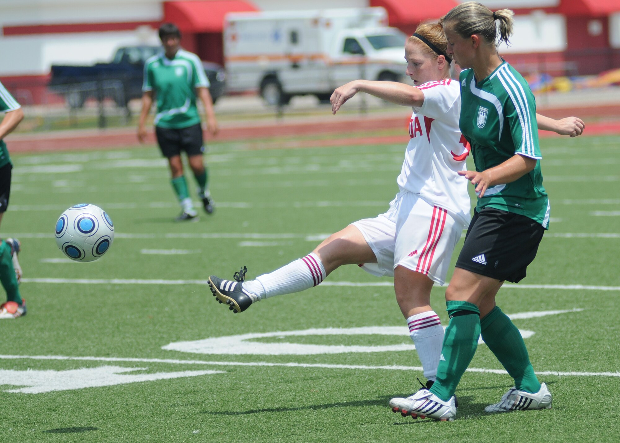 Germany took the consolation match over Canada, 4-1, during the final day of the 5th CISM Women’s Soccer Championship at the Biloxi High Stadium, June 13.  The CISM tournament, hosted by Keesler Air Force Base, also included teams from Brazil, France, The Netherlands, the Republic of South Korea and the United States.   The Brazilian team won the gold medal, Korea earned the silver medal and The Netherlands took the bronze medal.  (U.S. Air Force photo by Kemberly Groue)