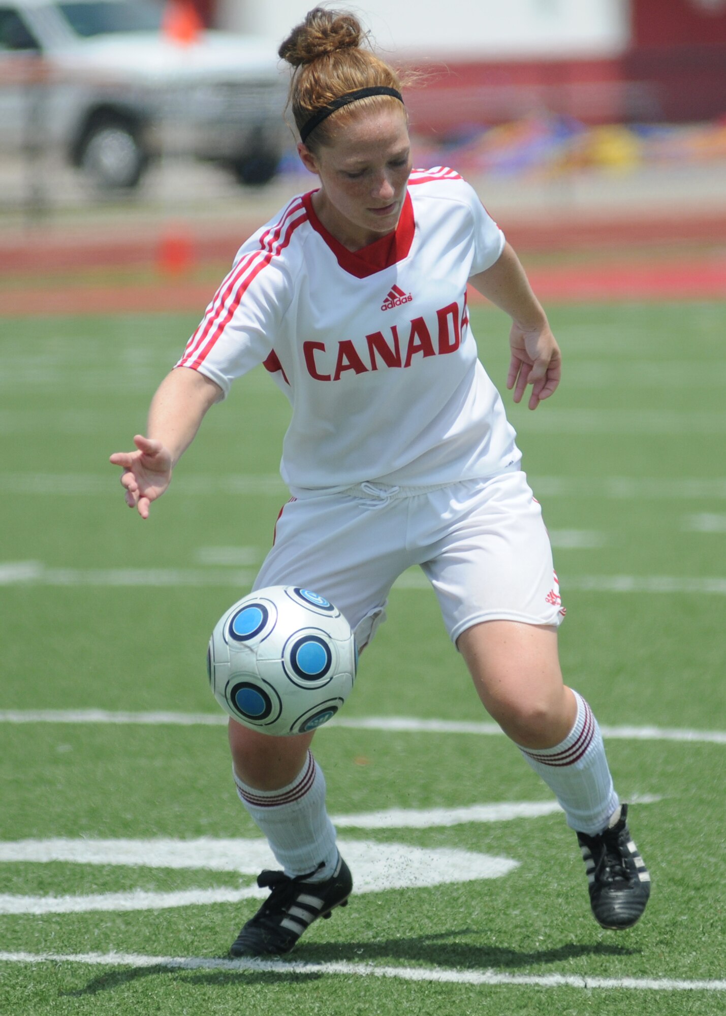 Germany took the consolation match over Canada, 4-1, during the final day of the 5th CISM Women’s Soccer Championship at the Biloxi High Stadium, June 13.  The CISM tournament, hosted by Keesler Air Force Base, also included teams from Brazil, France, The Netherlands, the Republic of South Korea and the United States.   The Brazilian team won the gold medal, Korea earned the silver medal and The Netherlands took the bronze medal.  (U.S. Air Force photo by Kemberly Groue)
