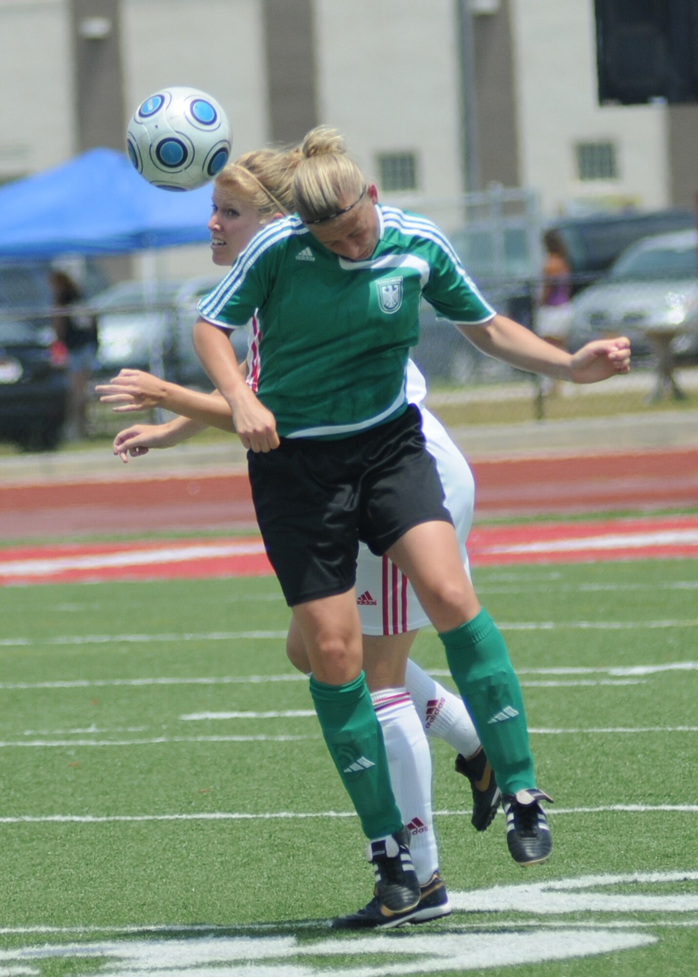 Germany took the consolation match over Canada, 4-1, during the final day of the 5th CISM Women’s Soccer Championship at the Biloxi High Stadium, June 13.  The CISM tournament, hosted by Keesler Air Force Base, also included teams from Brazil, France, The Netherlands, the Republic of South Korea and the United States.   The Brazilian team won the gold medal, Korea earned the silver medal and The Netherlands took the bronze medal.  (U.S. Air Force photo by Kemberly Groue)