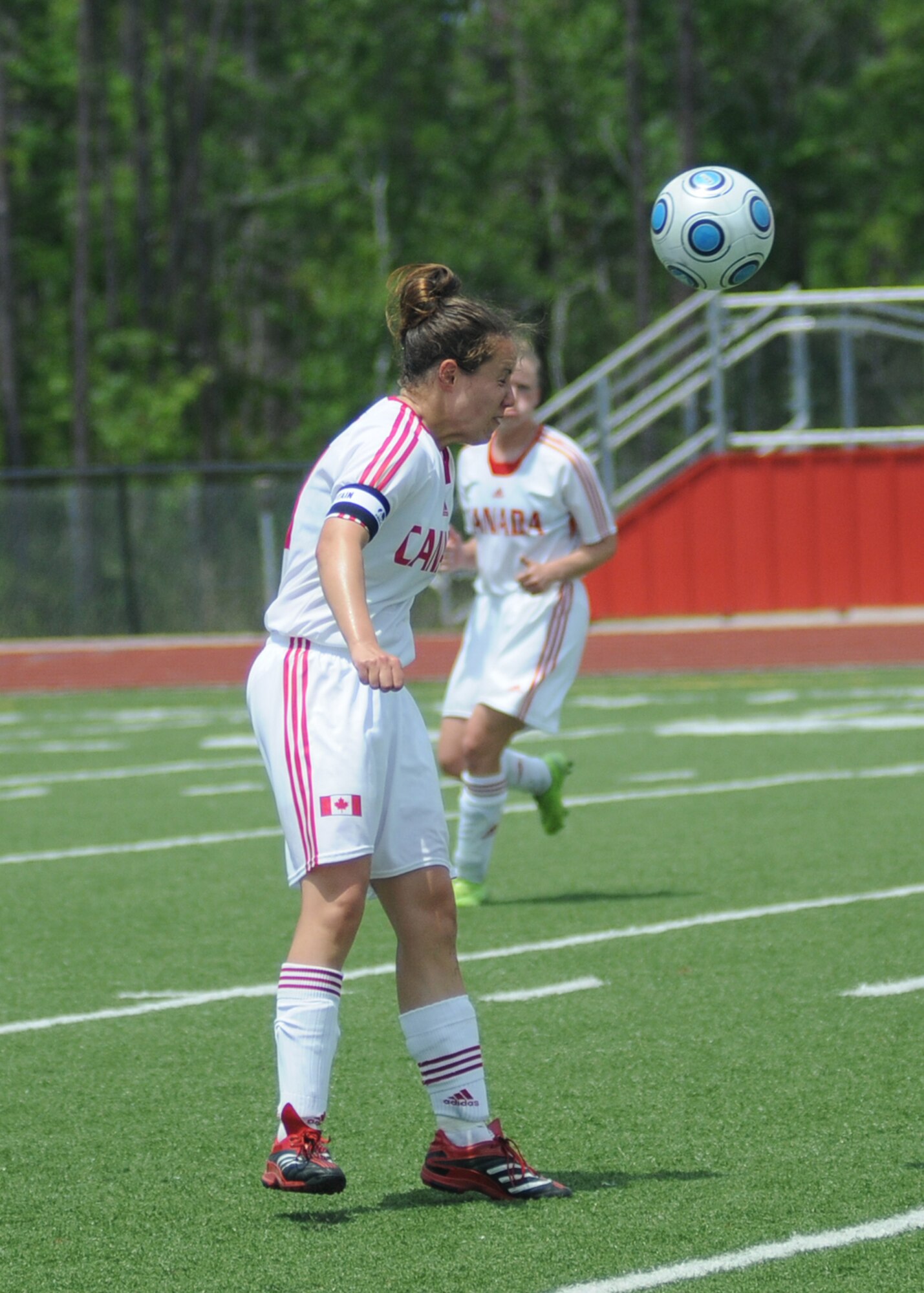 Germany took the consolation match over Canada, 4-1, during the final day of the 5th CISM Women’s Soccer Championship at the Biloxi High Stadium, June 13.  The CISM tournament, hosted by Keesler Air Force Base, also included teams from Brazil, France, The Netherlands, the Republic of South Korea and the United States.   The Brazilian team won the gold medal, Korea earned the silver medal and The Netherlands took the bronze medal.  (U.S. Air Force photo by Kemberly Groue)